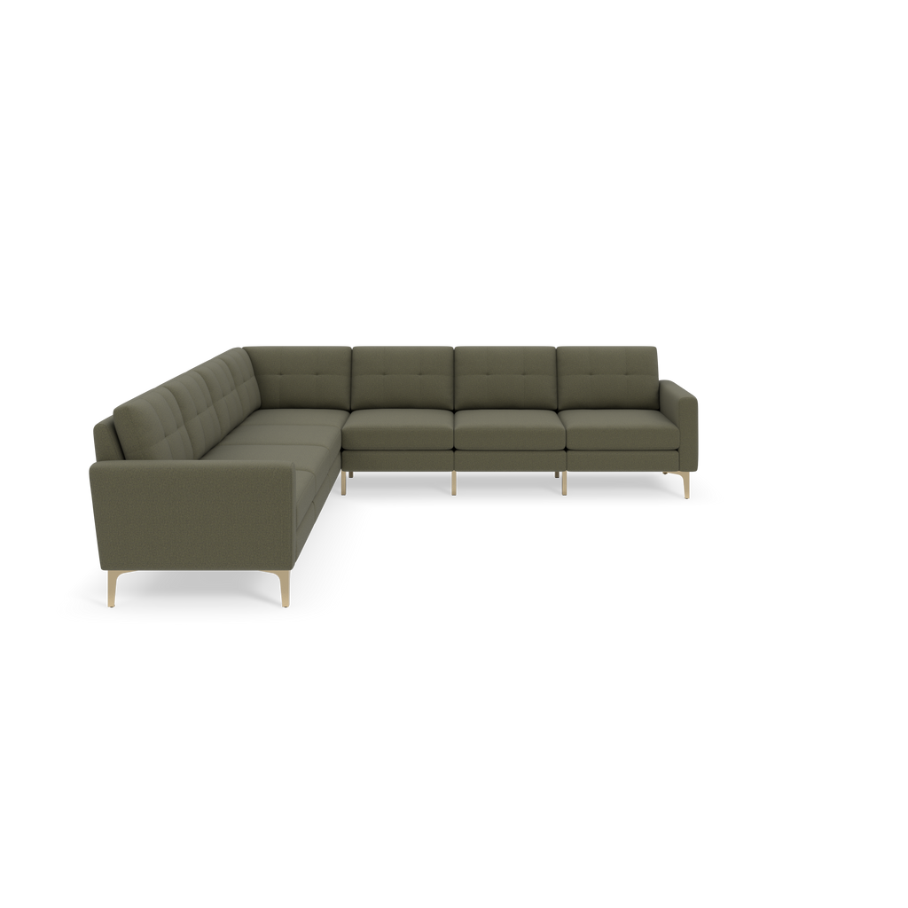 Modern L-shaped sectional sofa in muted Moss green fabric with tufted cushions and light wooden legs against a black background.
