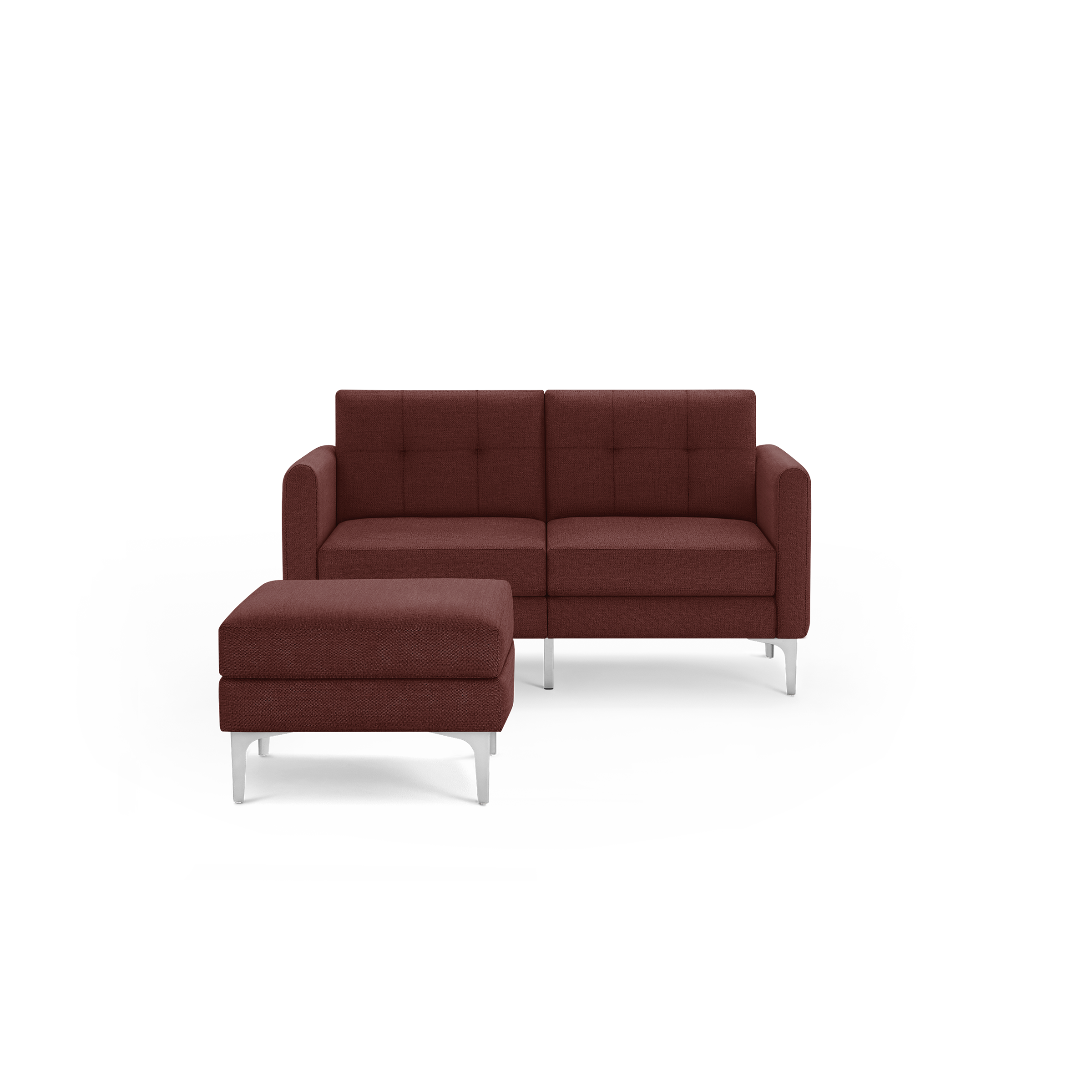 Modern two-piece sectional sofa and ottoman in deep red fabric with metal legs, featuring tufted back cushions.