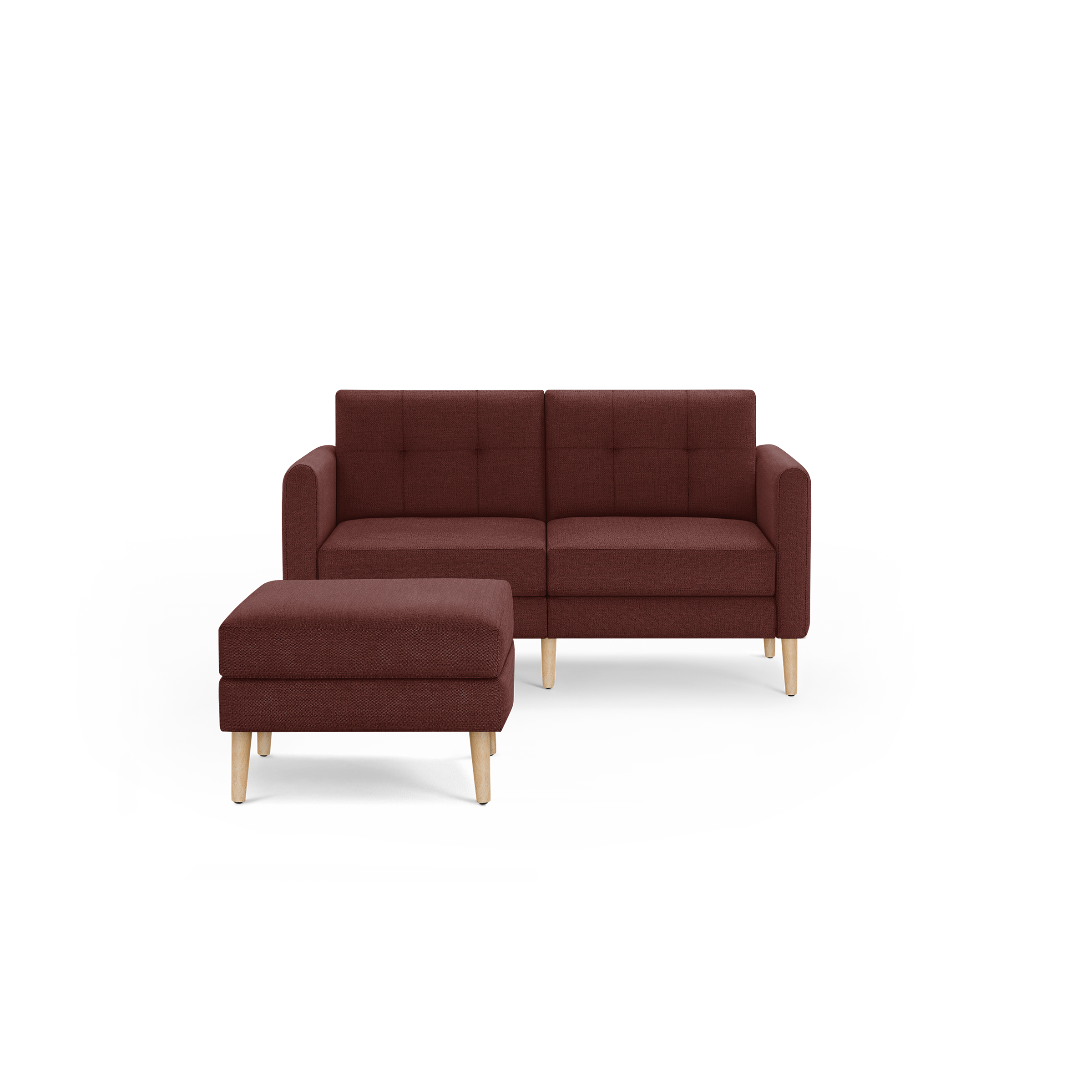 Compact modern two-seat sofa with matching ottoman, upholstered in deep red fabric with light wooden legs.