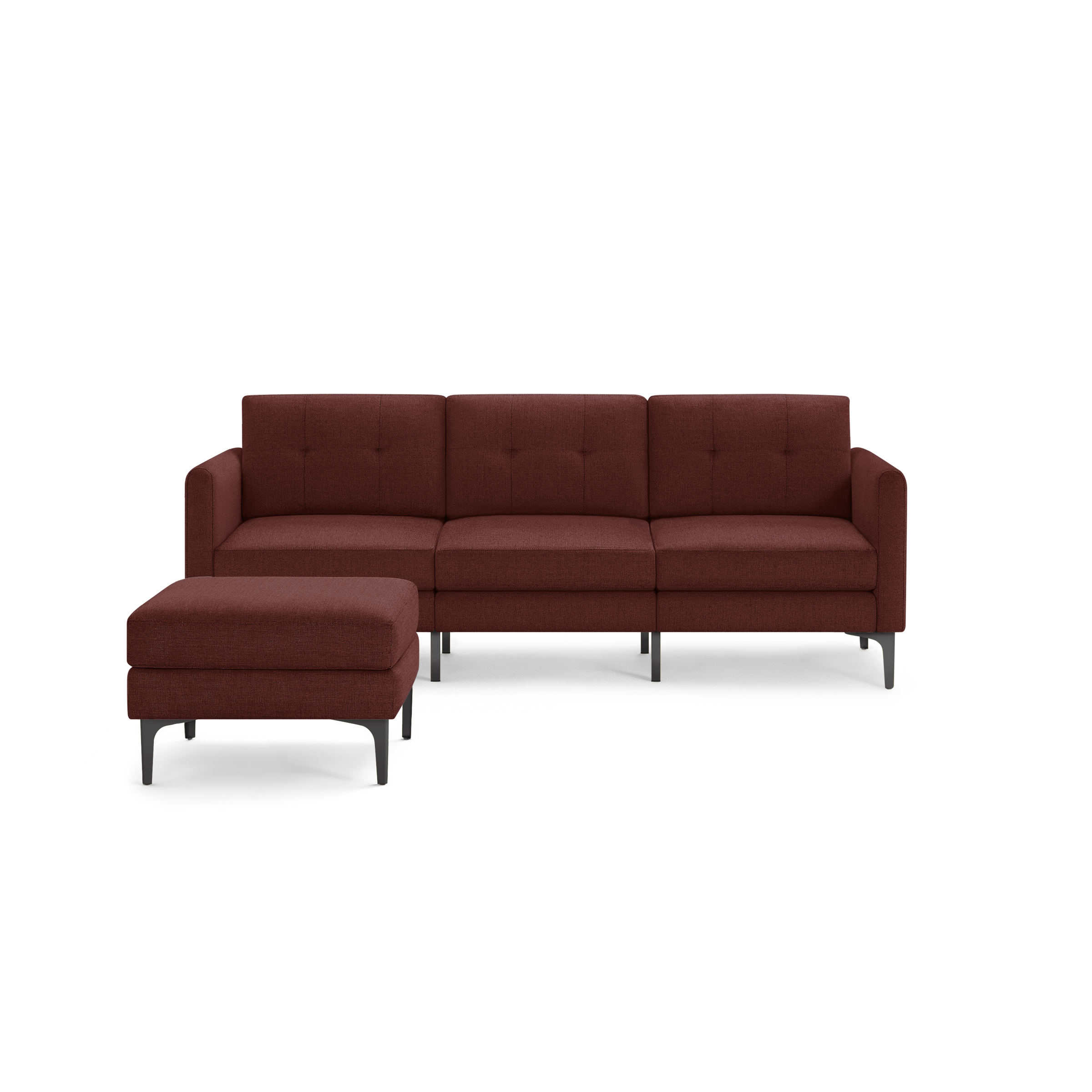 Mid-century modern sectional sofa with deep red upholstery and matching ottoman, featuring tufted cushions and sleek black metal legs.