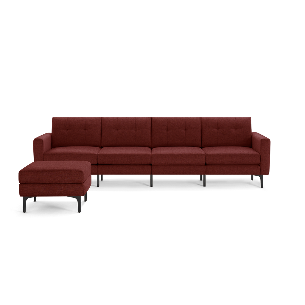 Modern sectional sofa with left chaise in deep red fabric, tufted back cushions, and slim black metal legs.