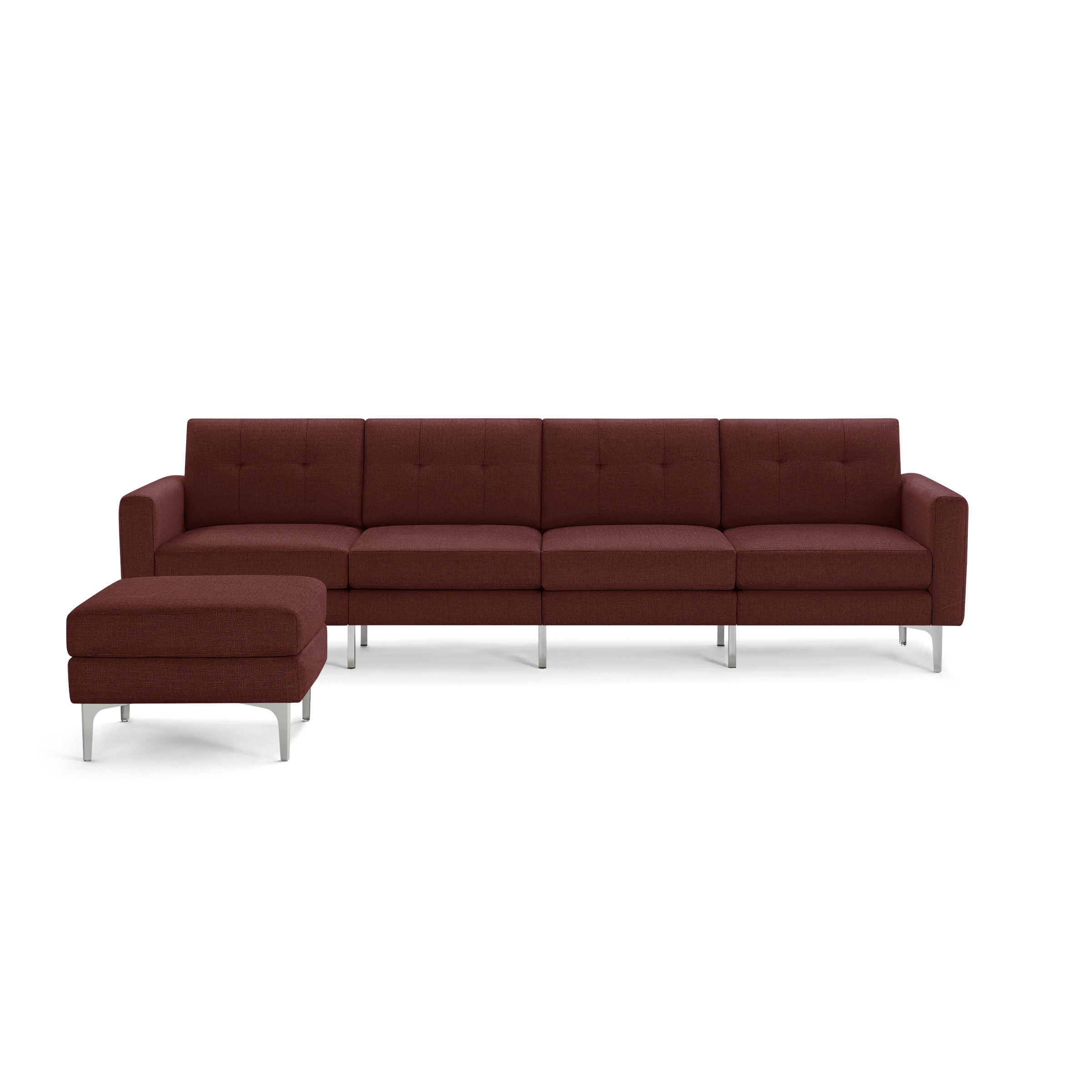 Modern deep red sectional sofa with tufted cushions, metal legs, and matching ottoman, designed for spacious living rooms.