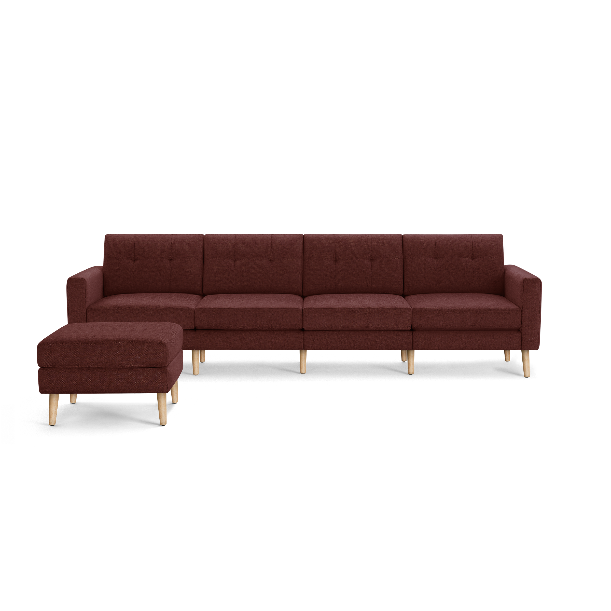 Burgundy fabric sectional sofa with tufted back cushions, wooden legs, and a matching ottoman.