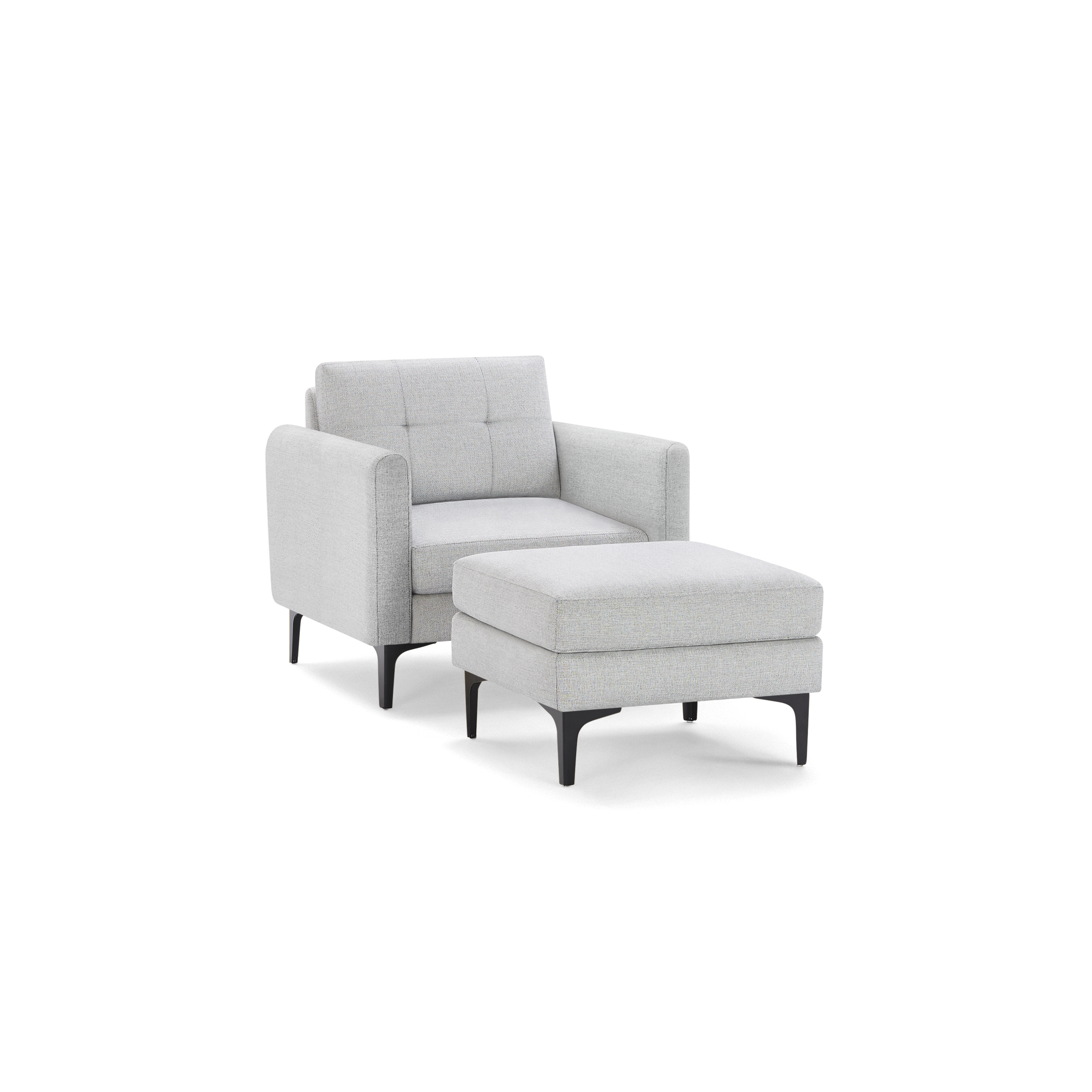 Light gray upholstered armchair with matching cushioned ottoman and black metal legs, featuring modern design and tufted backrest.