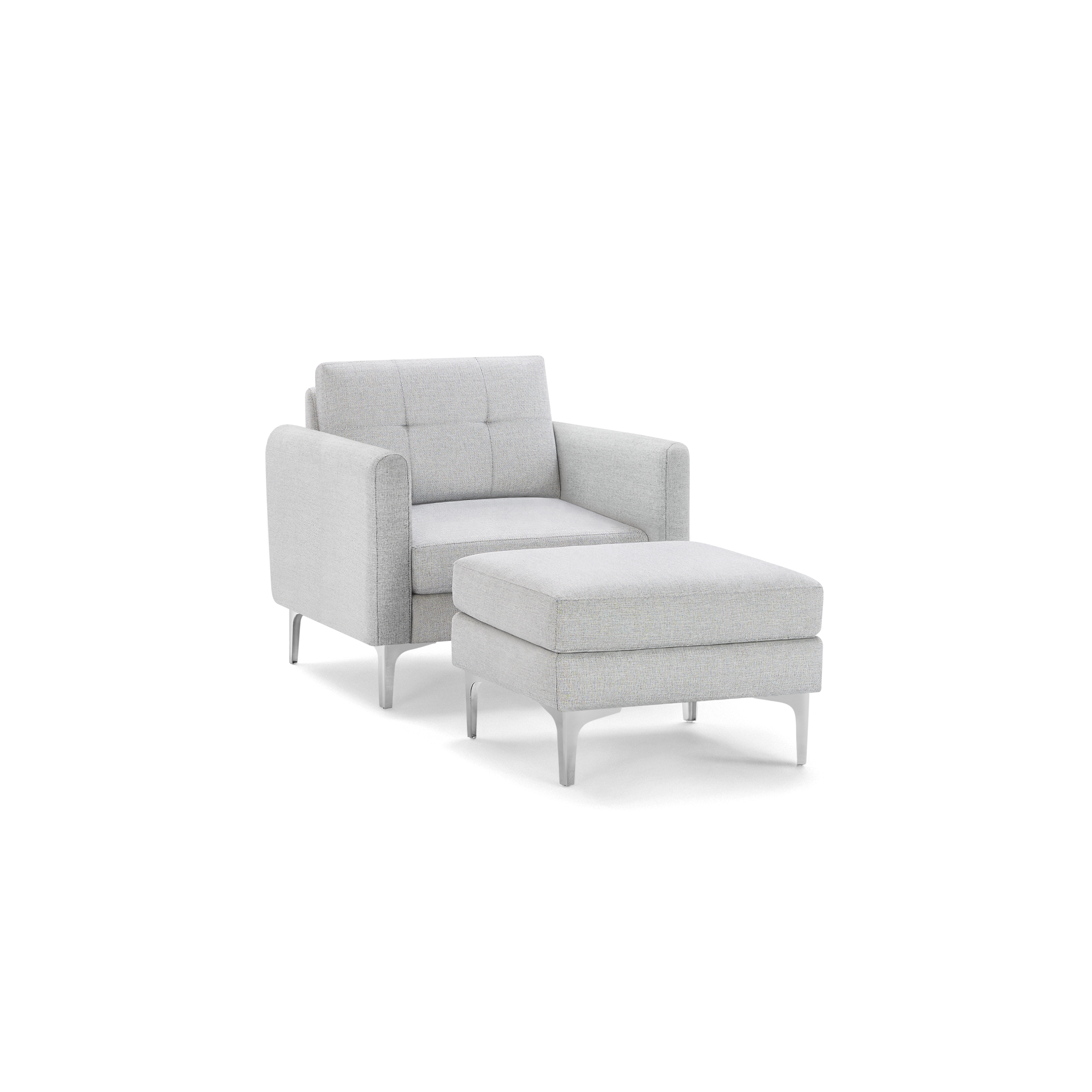 Light grey upholstered armchair with button-tufted backrest and matching cushioned ottoman, both featuring sleek metal legs.