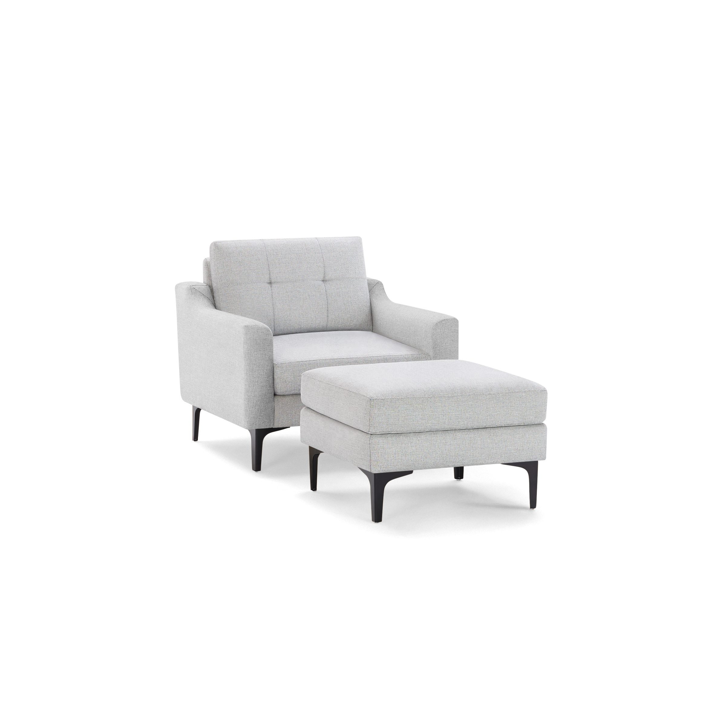 Modern light gray fabric armchair with matching cushioned ottoman, both featuring black tapered legs and clean, minimalist design.
