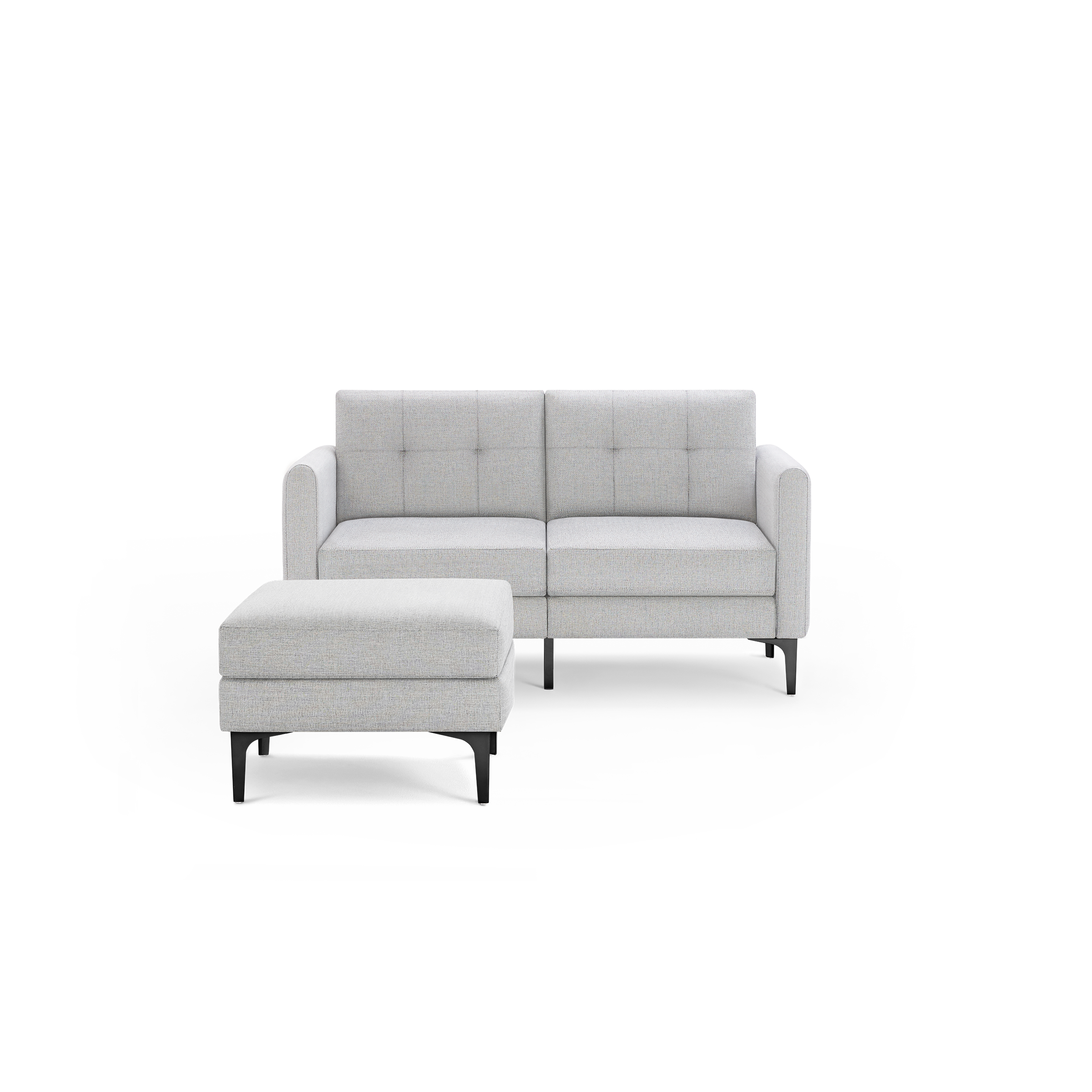 Light grey upholstered two-seater sofa with button-tufted back cushions and matching square ottoman on black legs.