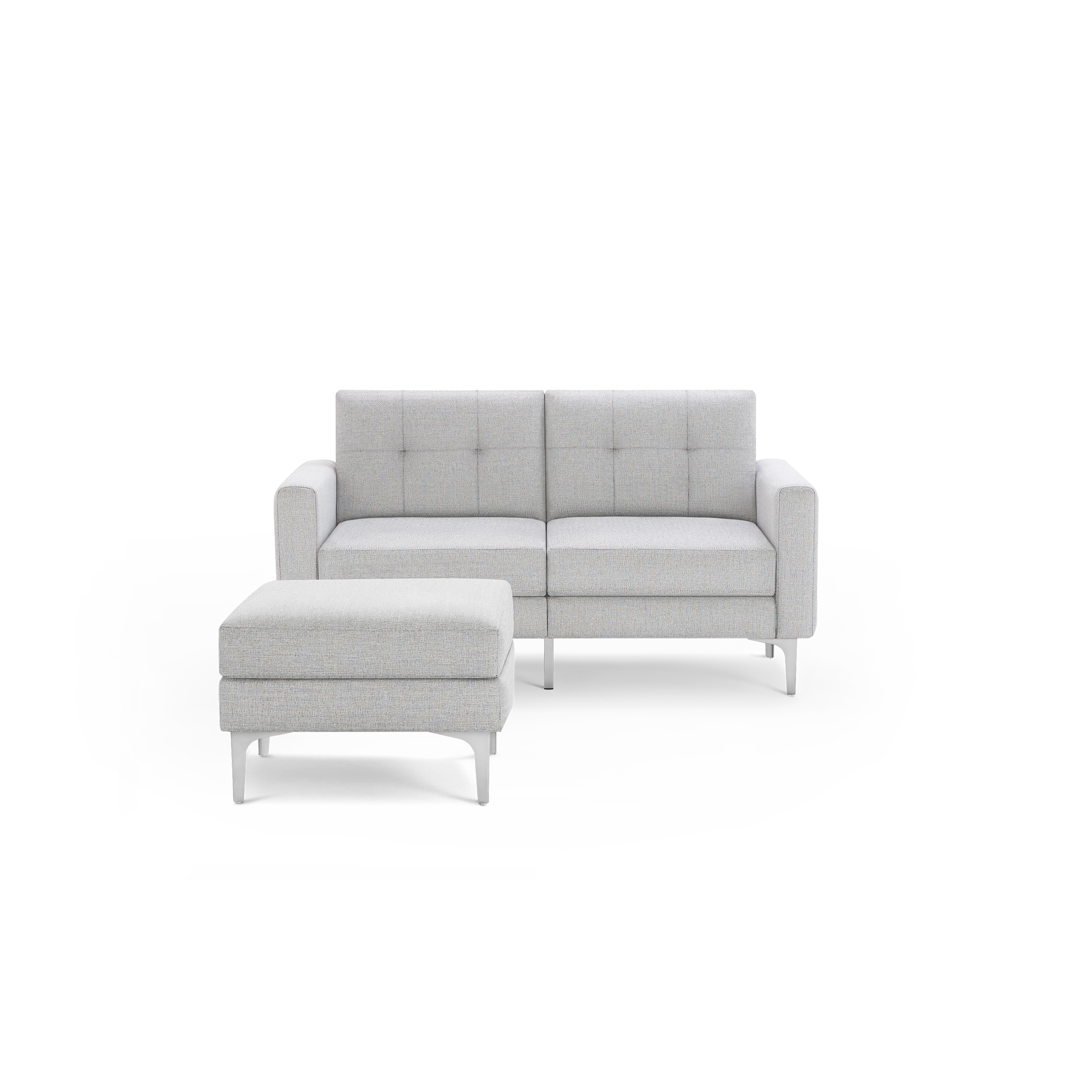 Light gray upholstered two-seater sofa with matching ottoman, square armrests, tufted back cushions, and slender metal legs.
