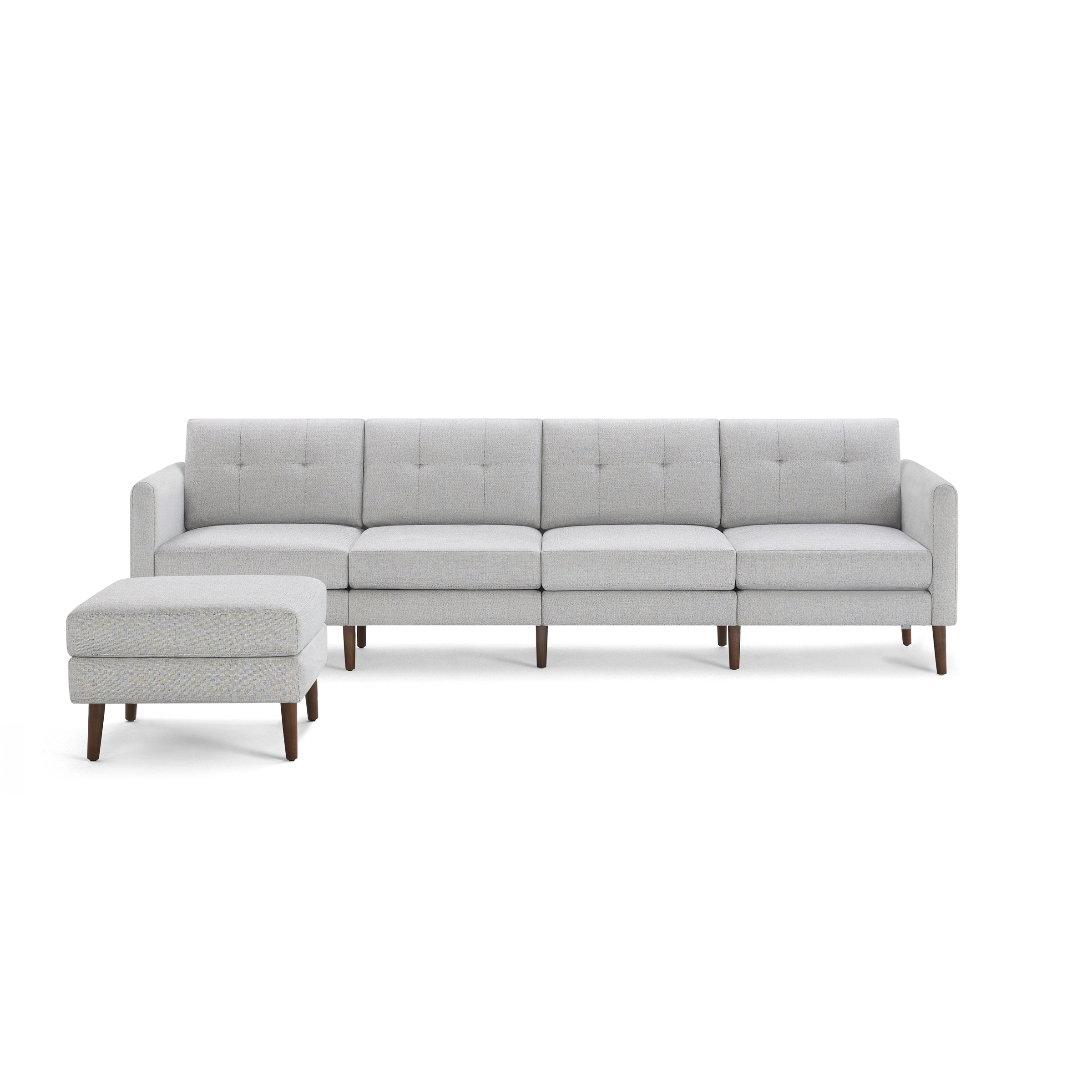 Light gray modern sectional sofa with tufted cushions, clean lines, and wooden tapered legs, accompanied by a matching ottoman.