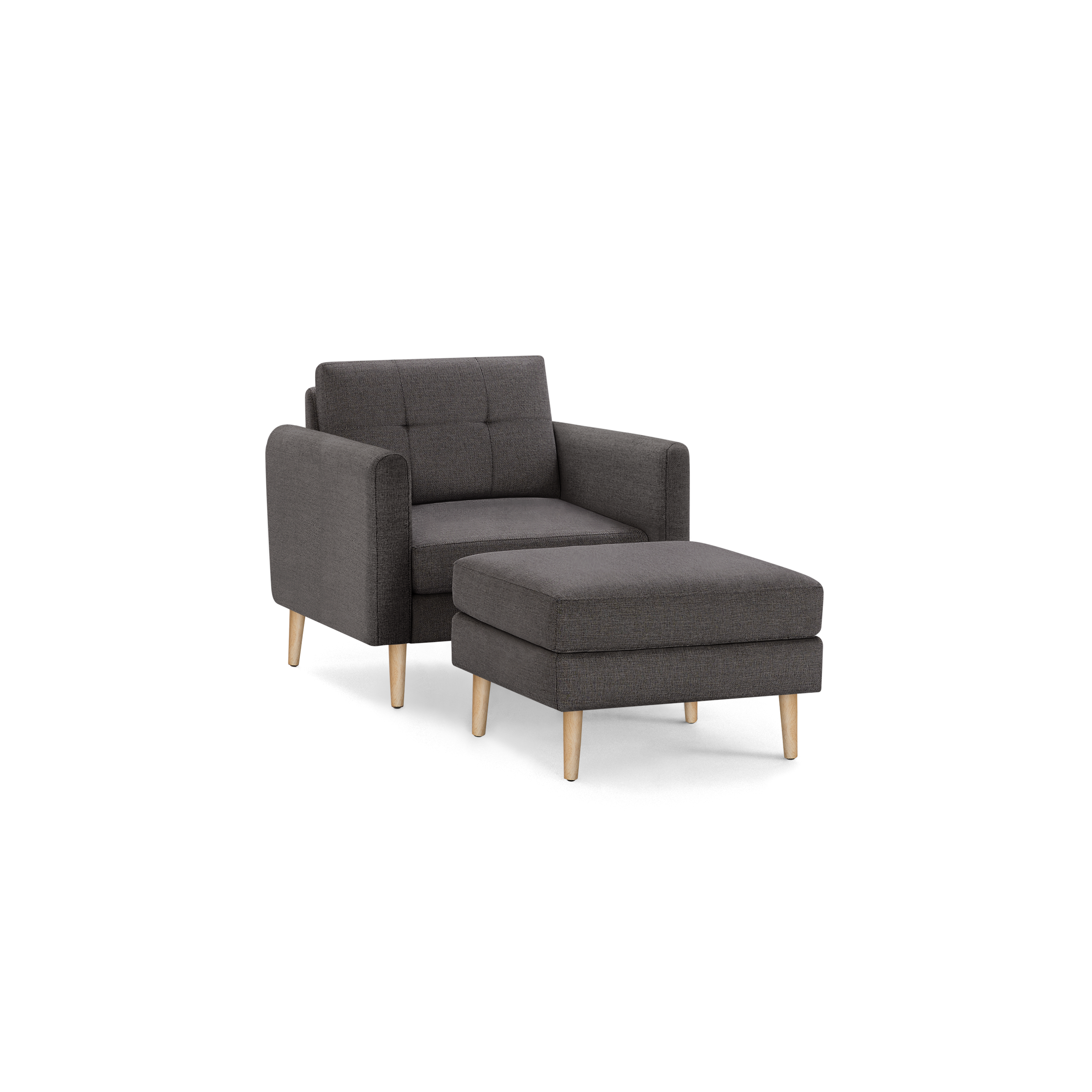 Dark gray fabric armchair with matching cushioned ottoman, both featuring wooden legs and modern, minimalist design.