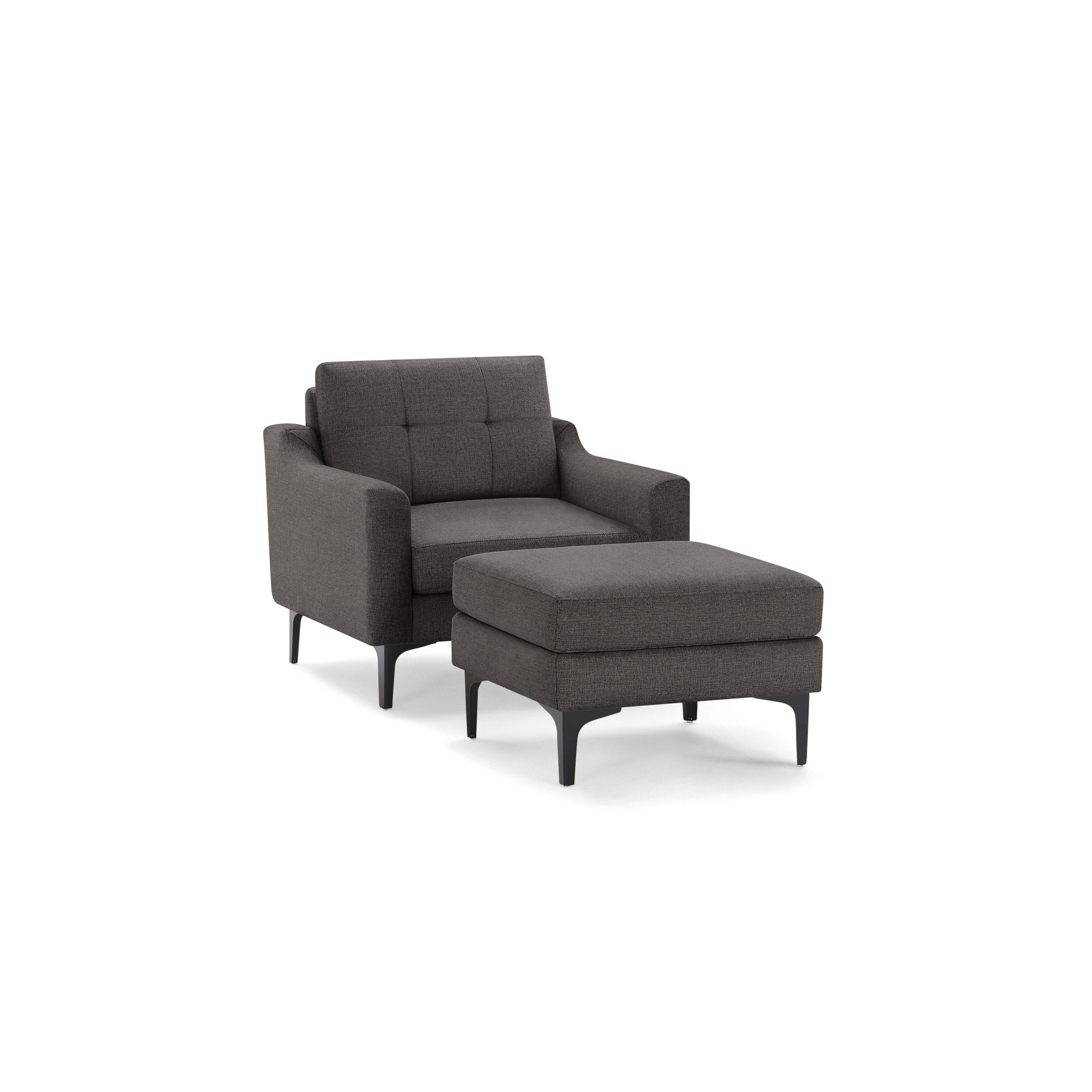 Dark gray upholstered armchair with tufted backrest and matching cushioned ottoman, both supported by black tapered legs.