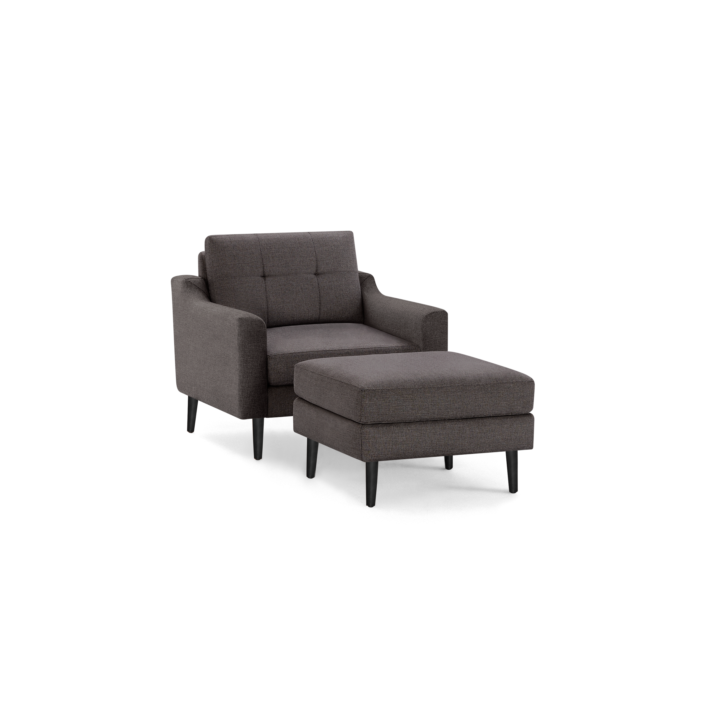 Dark gray upholstered armchair with matching cushioned ottoman, featuring black tapered legs and tufted backrest.