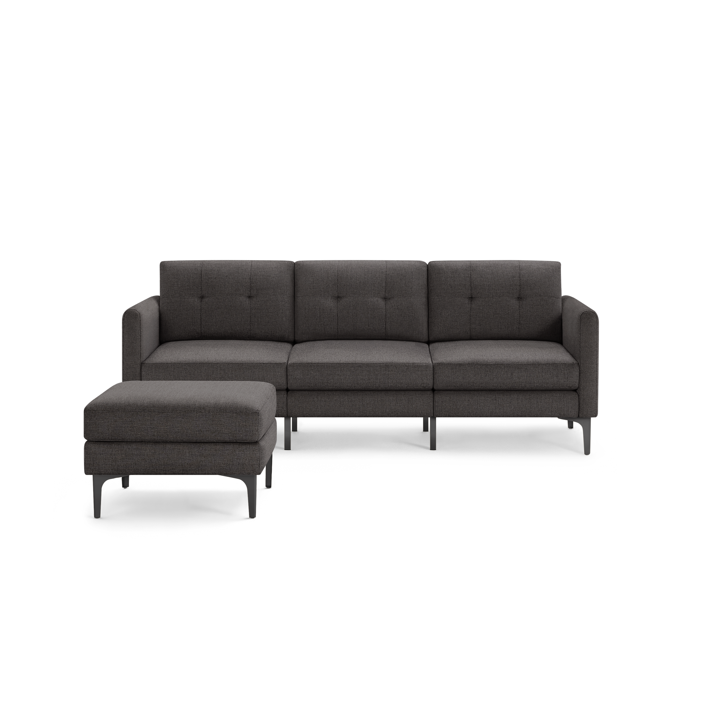 Dark gray modern fabric sectional sofa with tufted back cushions and matching ottoman on metal legs.