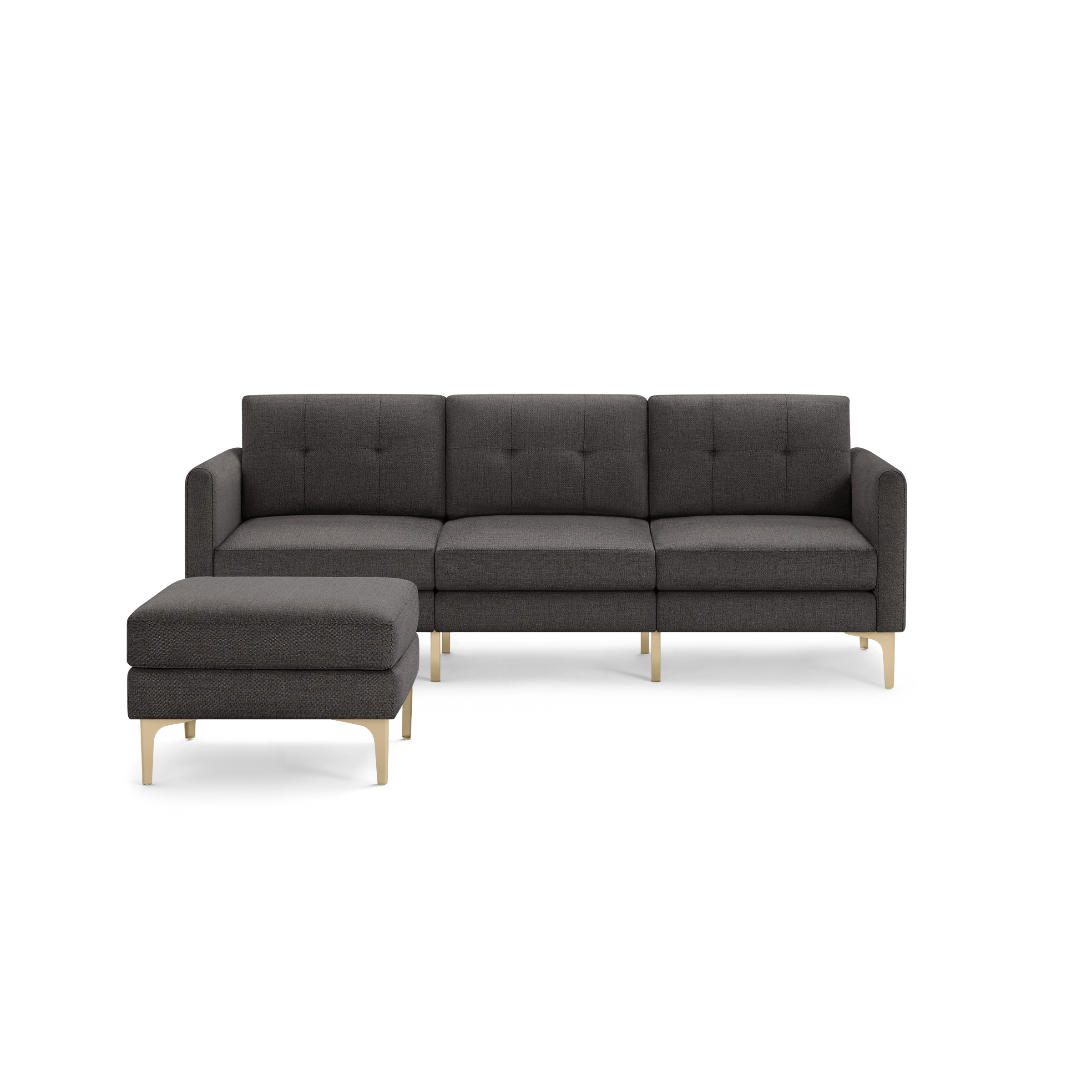 Modern dark gray fabric sectional sofa with tufted back cushions and light wooden legs, including a matching ottoman.