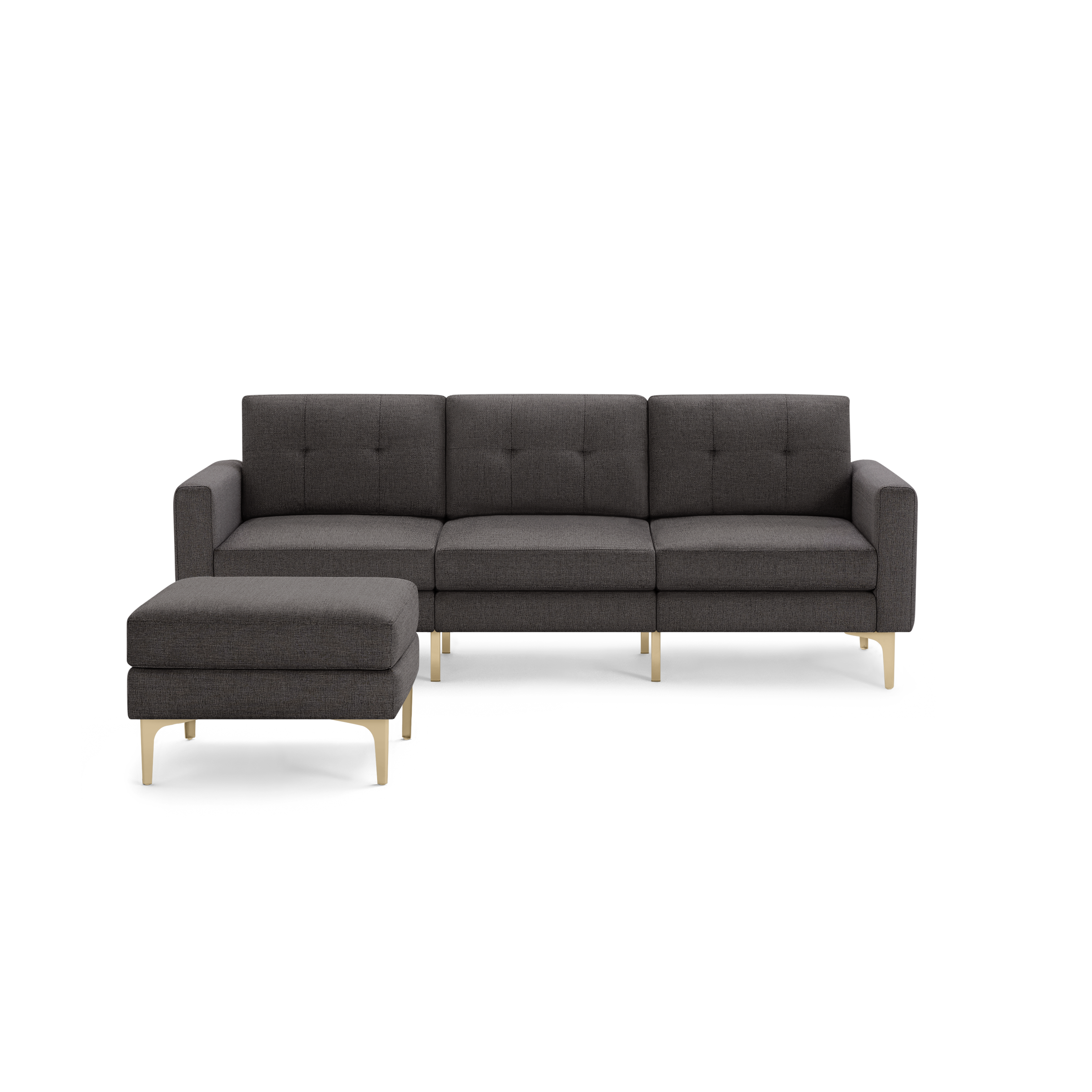 Modern dark gray fabric sectional sofa with tufted back cushions and light wooden legs, paired with a matching ottoman.