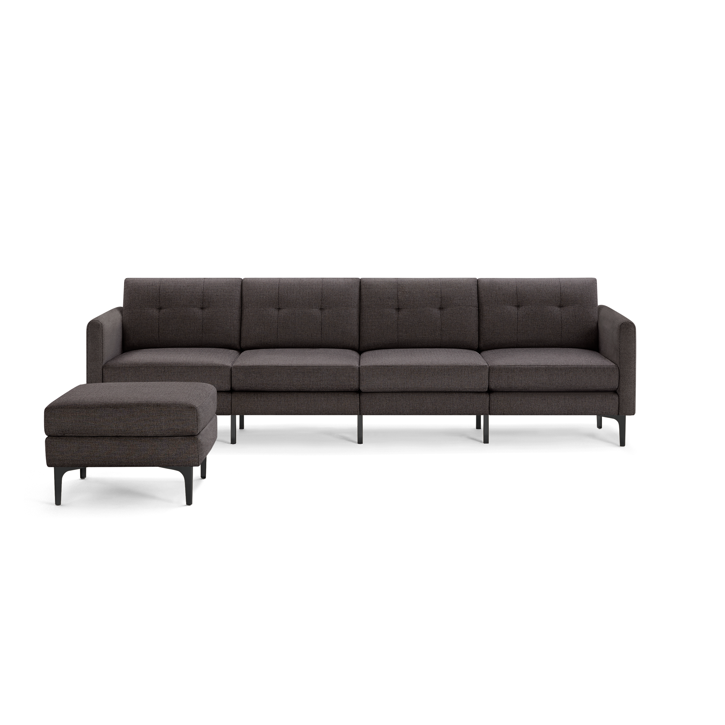 Modern dark gray fabric sectional sofa with tufted backrest, four seats, armrests, and a matching cushioned ottoman on black legs.