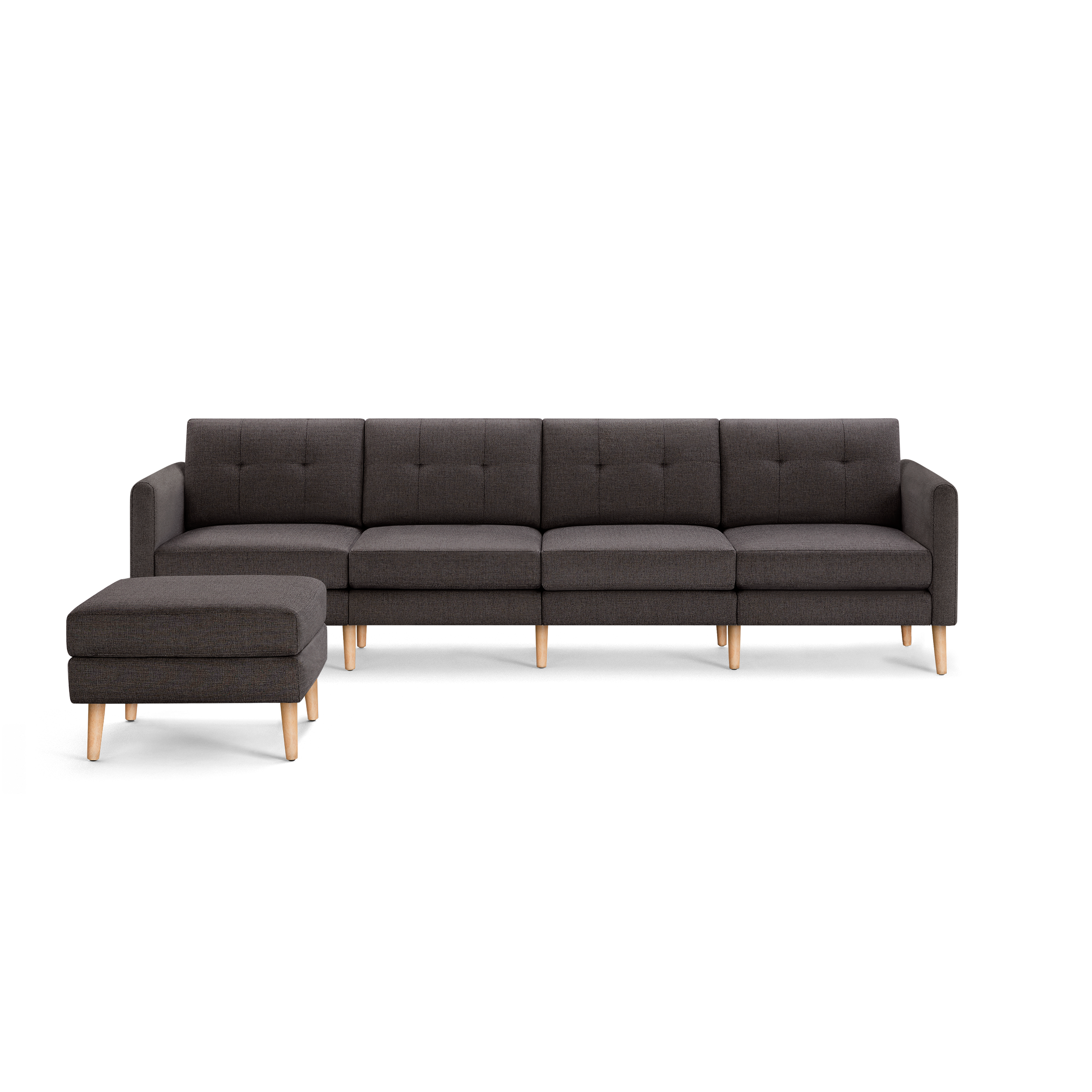 Dark gray modern sectional sofa with tufted back cushions and light wooden legs, accompanied by matching ottoman.