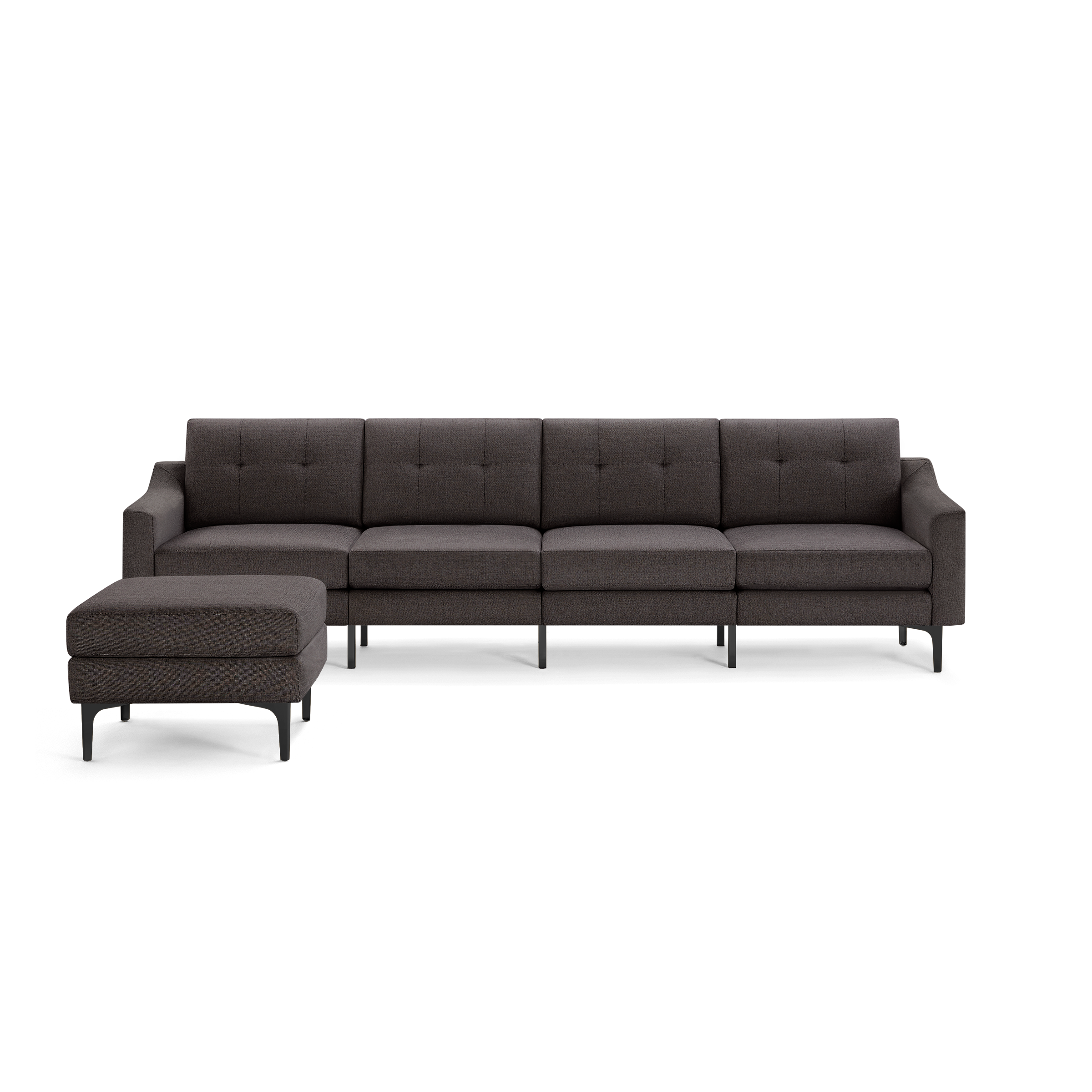 Modern dark gray upholstered sectional sofa with button-tufted back cushions and matching ottoman on black metal legs.