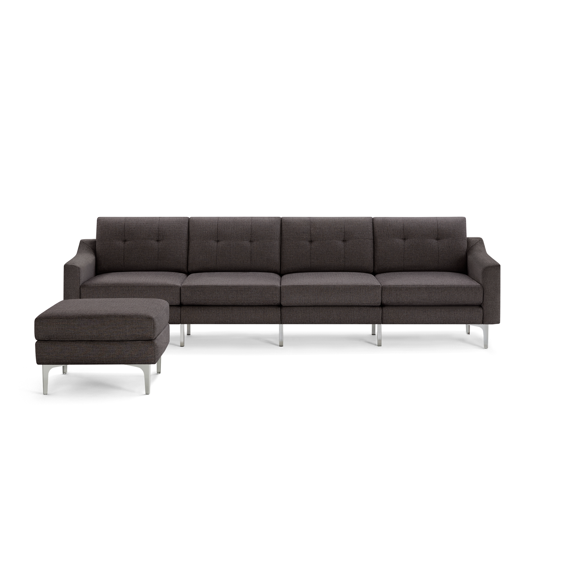 Modern dark gray fabric sectional sofa with tufted cushions, metal legs, and separate ottoman.