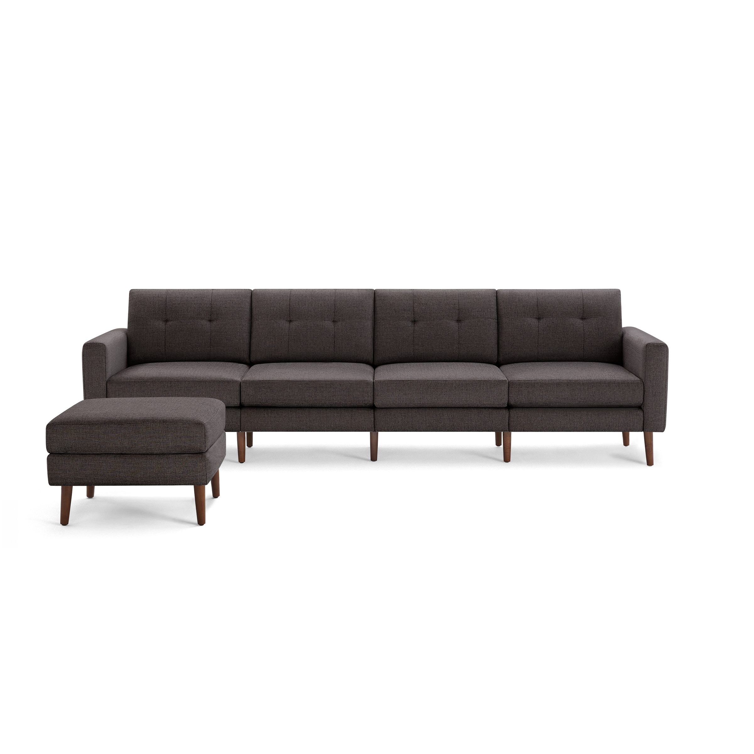 Modern dark gray fabric sectional sofa with tufted back cushions and matching ottoman on wooden legs.
