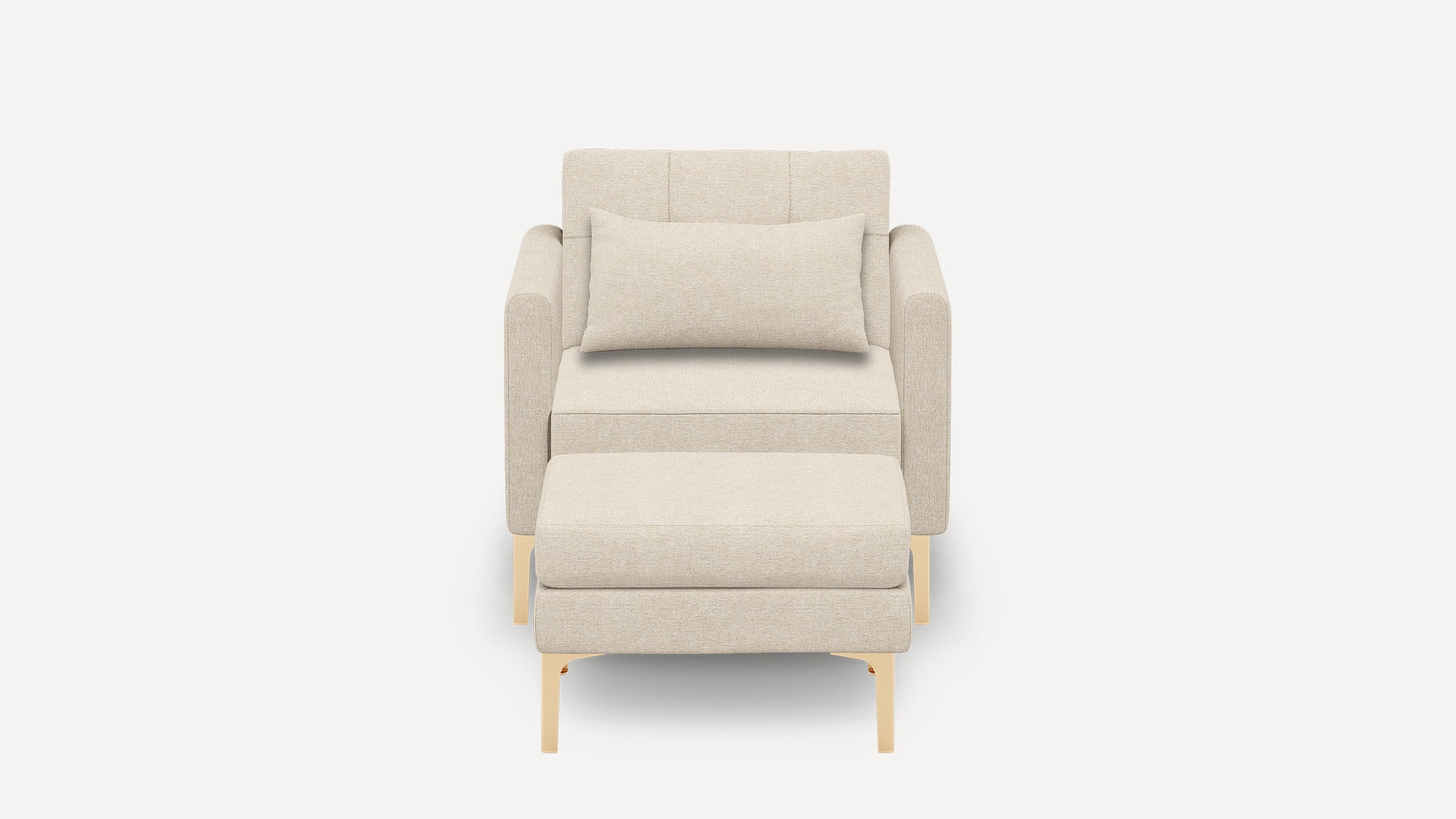 Front view of a modern beige upholstered armchair with matching ottoman and rectangular lumbar pillow, featuring light wooden legs.