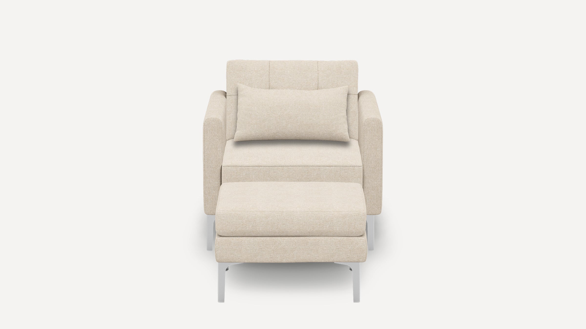 Front view of a modern beige upholstered armchair with a matching ottoman and a rectangular lumbar pillow.
