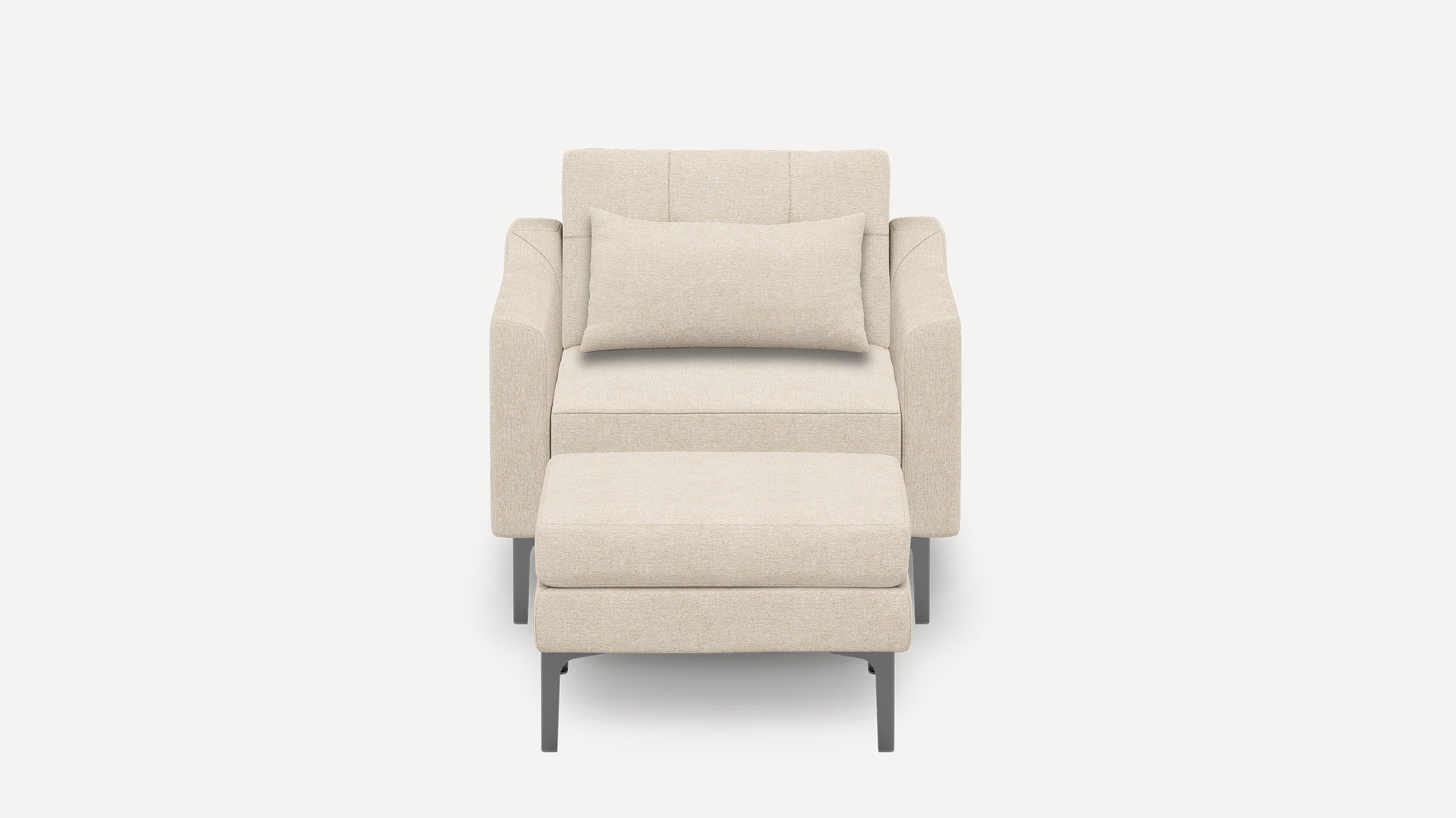 Beige modern armchair with matching ottoman, featuring clean lines, soft fabric upholstery, and slim metal legs.