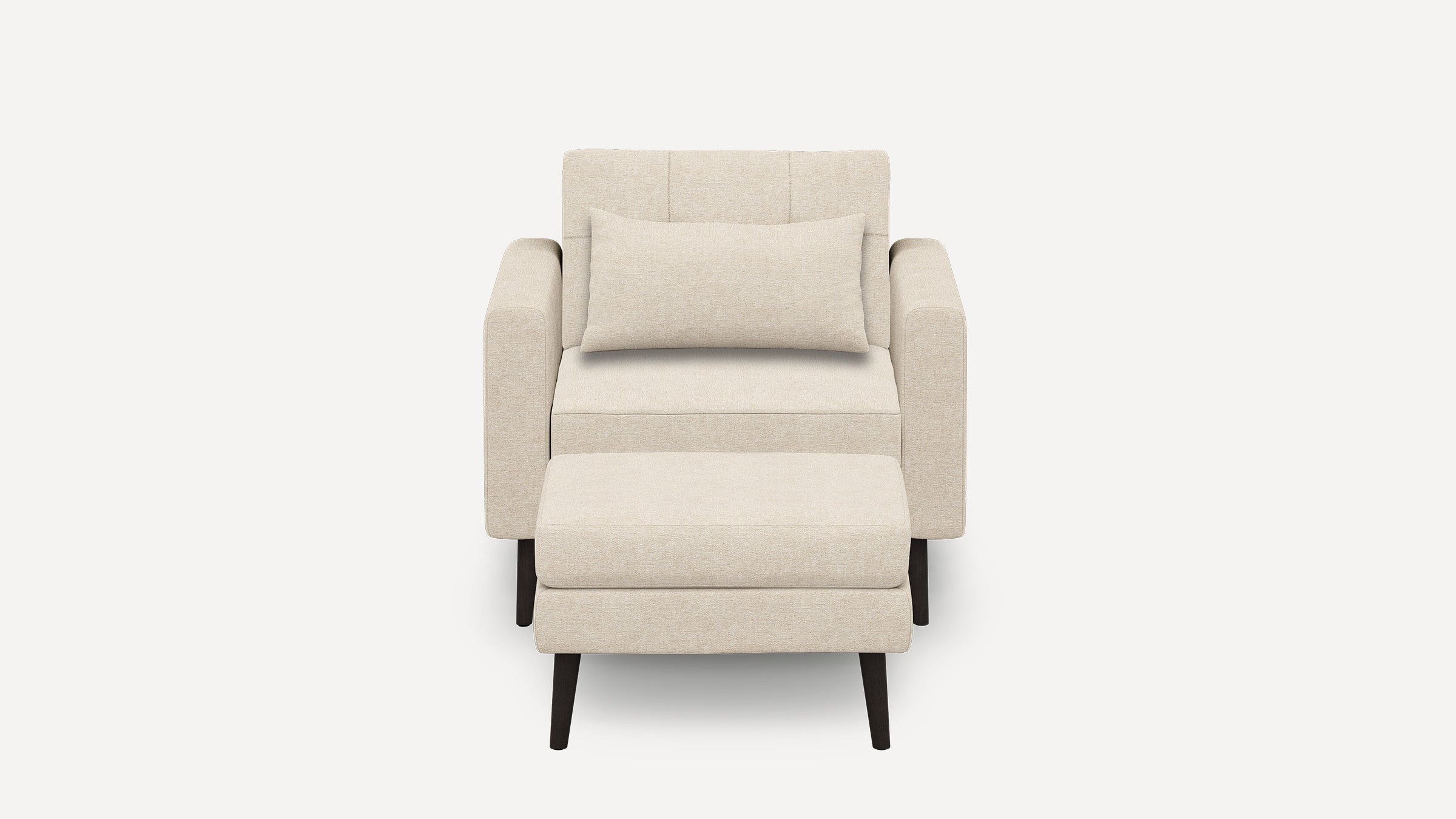 Beige fabric armchair with rectangular cushion and matching ottoman, supported by dark wooden tapered legs, pictured against a white background.