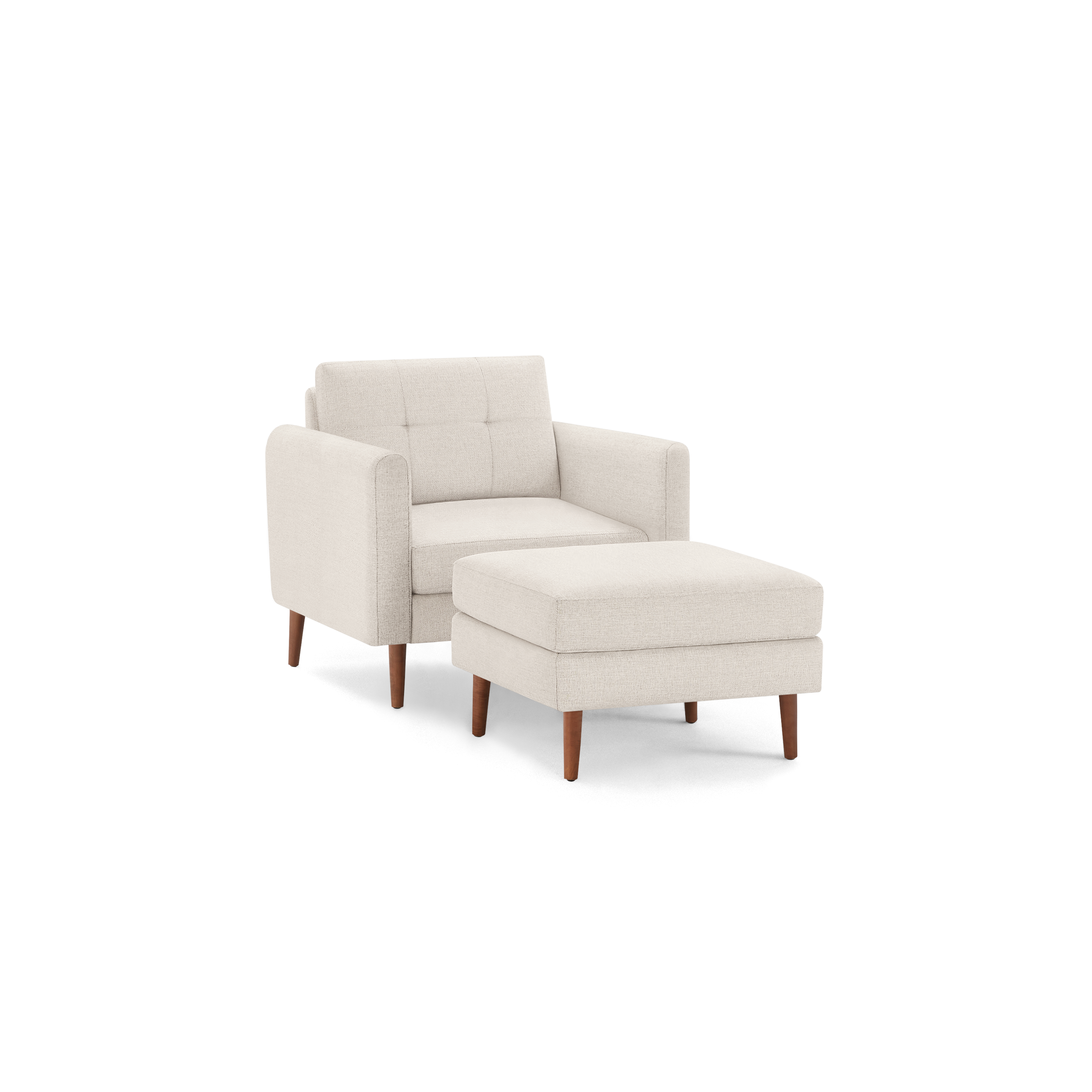 Beige fabric armchair with matching cushioned ottoman, featuring wooden legs and tufted backrest, isolated on black background.