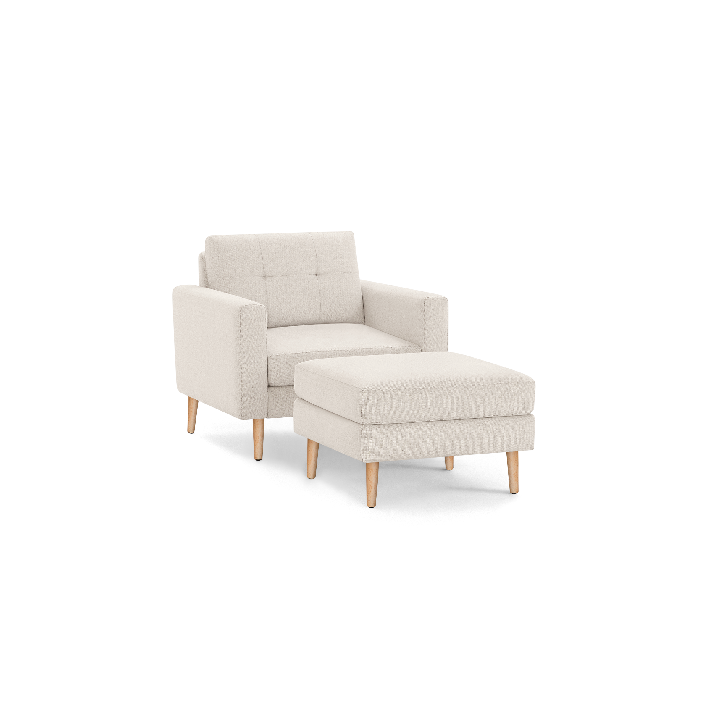 Beige fabric armchair with tufted backrest and matching ottoman, both supported by four light wood legs.