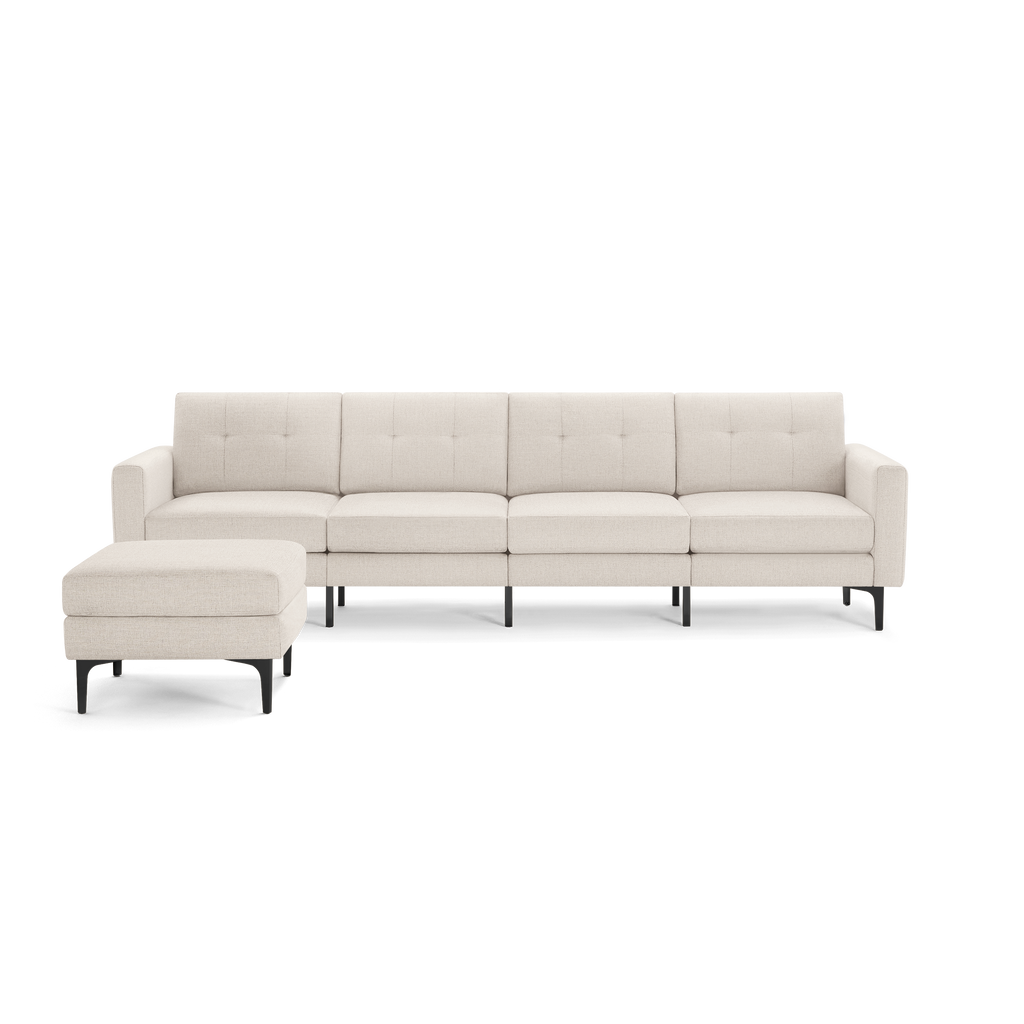 Modern beige sectional sofa with left chaise lounge, tufted back cushions, and black metal legs.