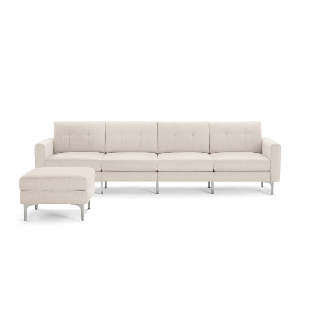 Cream-colored modern sectional sofa with tufted back cushions, metal legs, and left-side chaise lounge ottoman.