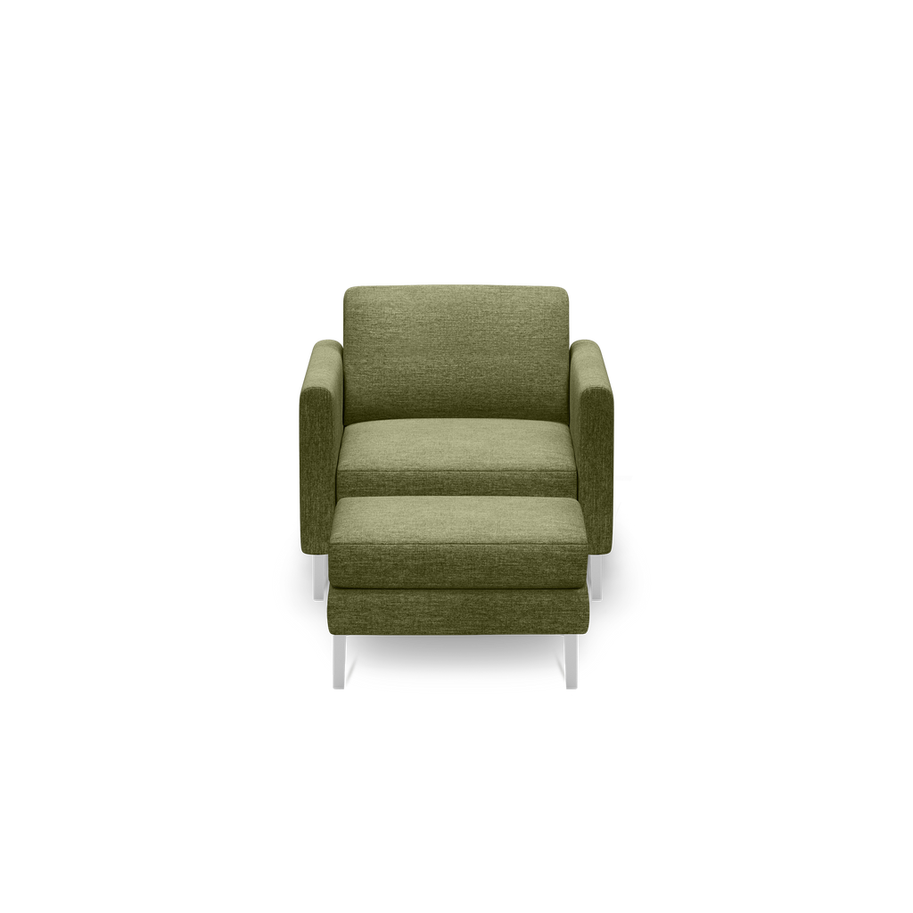 Front view of a modern olive green upholstered armchair with straight arms and silver metal legs, isolated on black background.