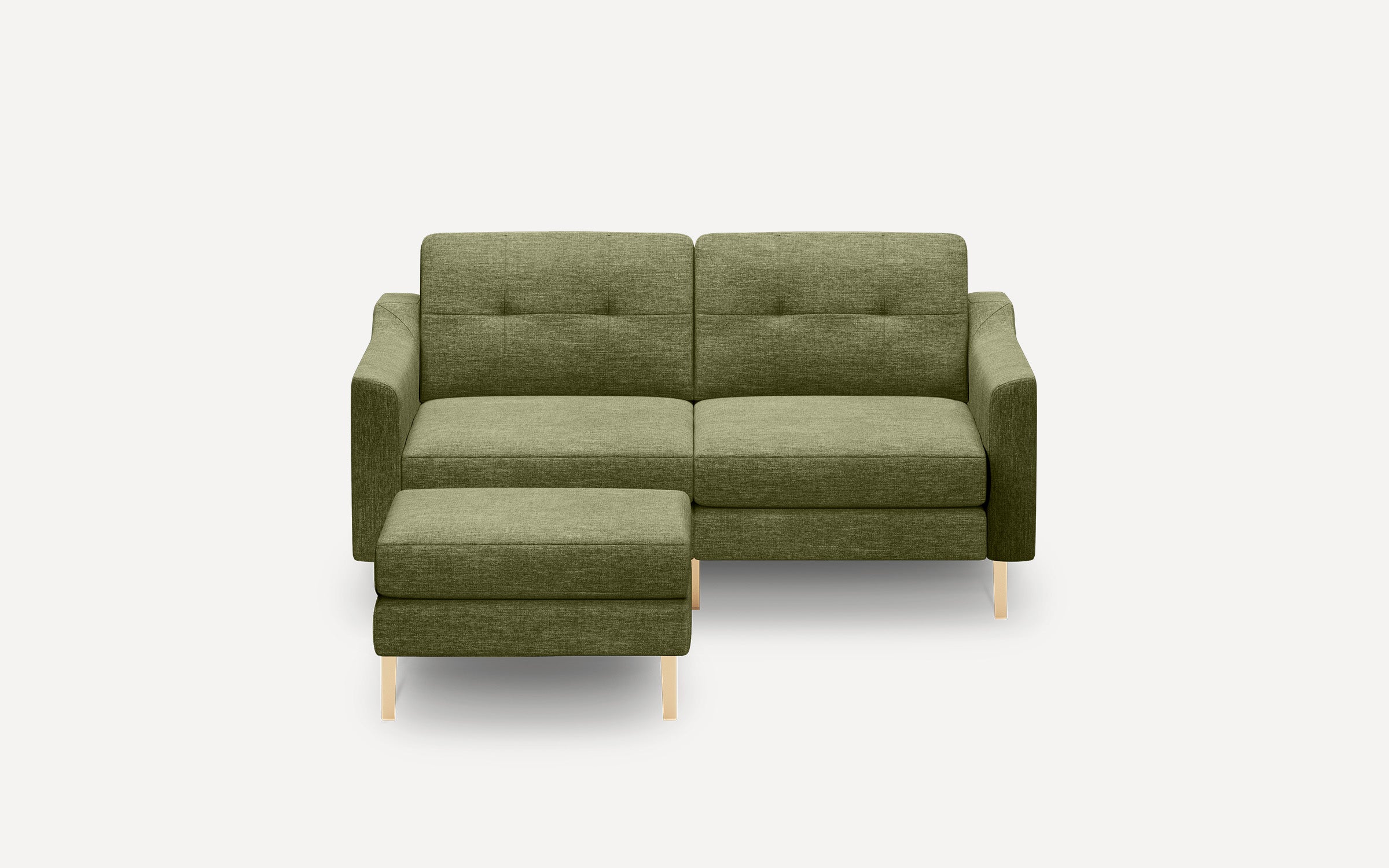 Modern olive green fabric sectional sofa with tufted back cushions and light wooden legs, including a matching ottoman.