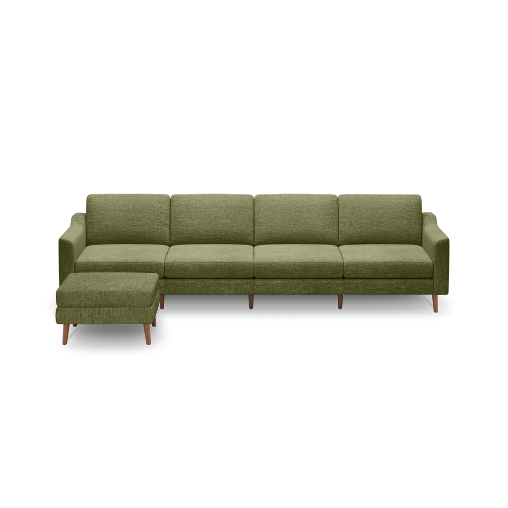 Olive green sectional sofa with four cushions and matching ottoman, supported by wooden legs, modern and minimalist design.