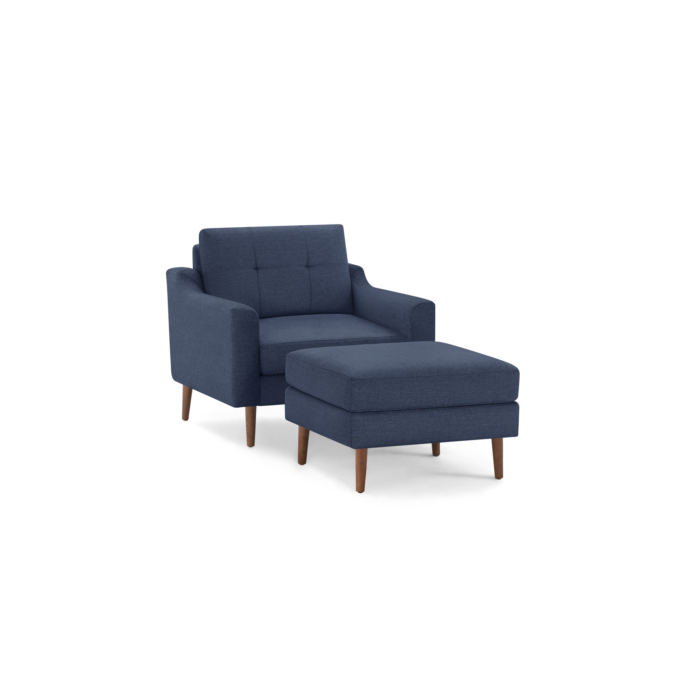 Modern navy blue upholstered armchair with tufted backrest and matching cushioned ottoman, both featuring wooden legs.