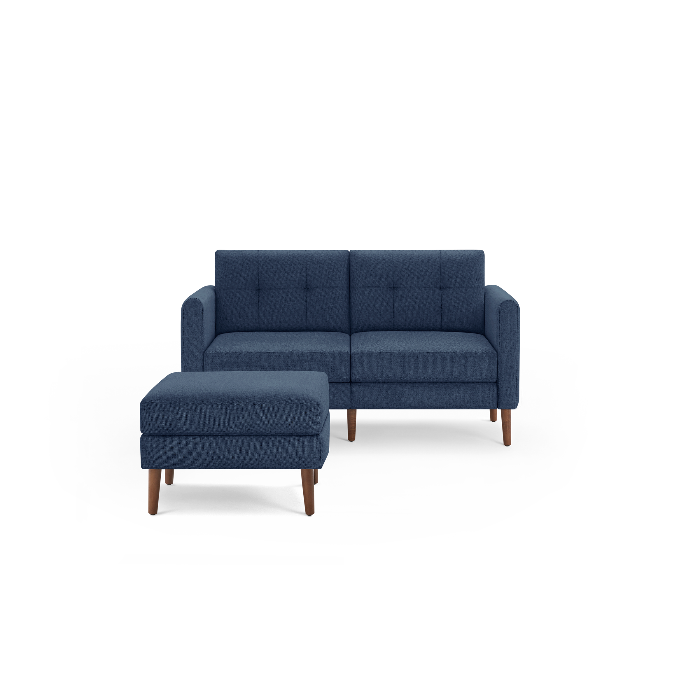 Modern two-seater navy blue fabric sofa with tufted back cushions and matching ottoman, both featuring wooden legs.