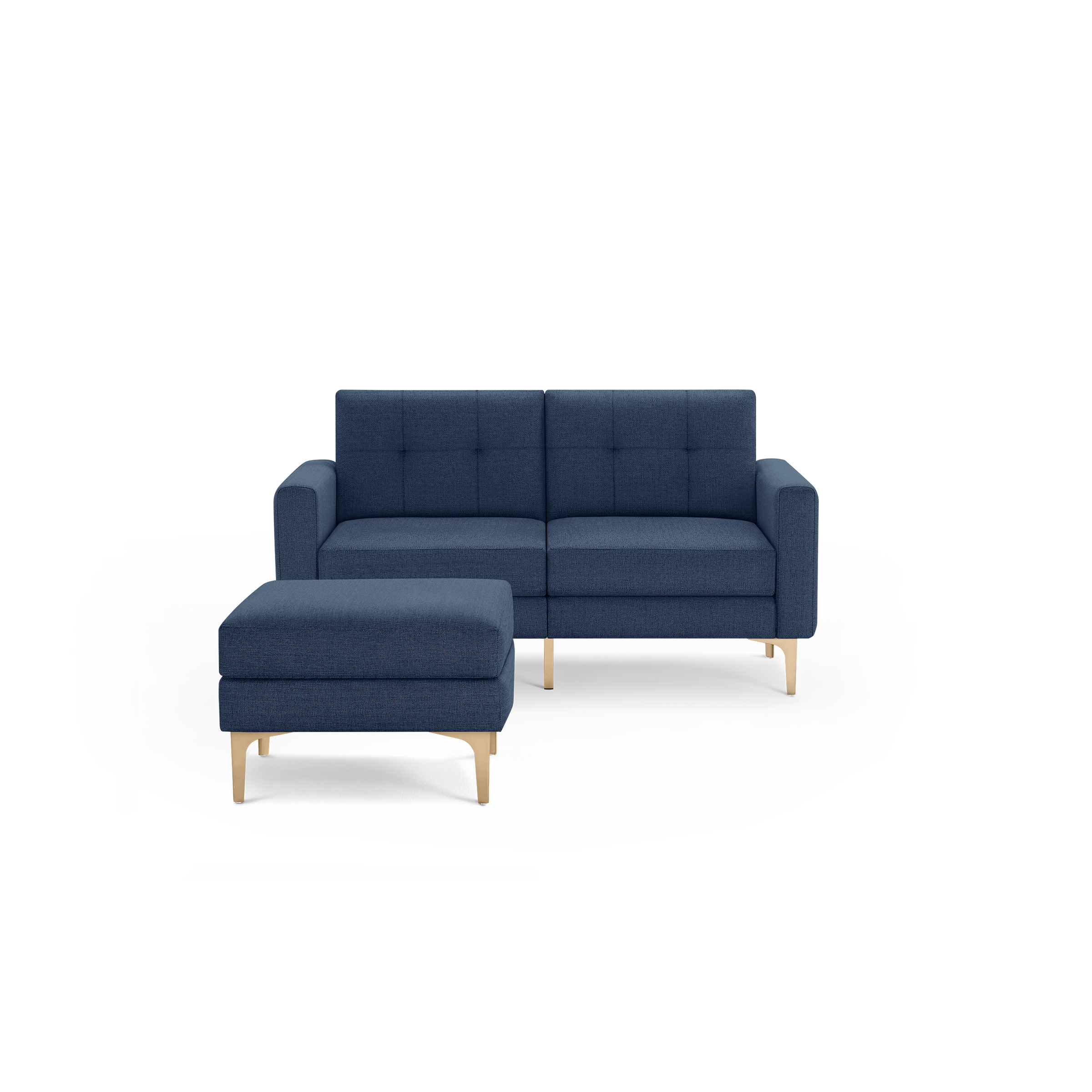 Modern navy blue fabric loveseat with matching ottoman featuring tufted cushions and light wooden legs on a black background.
