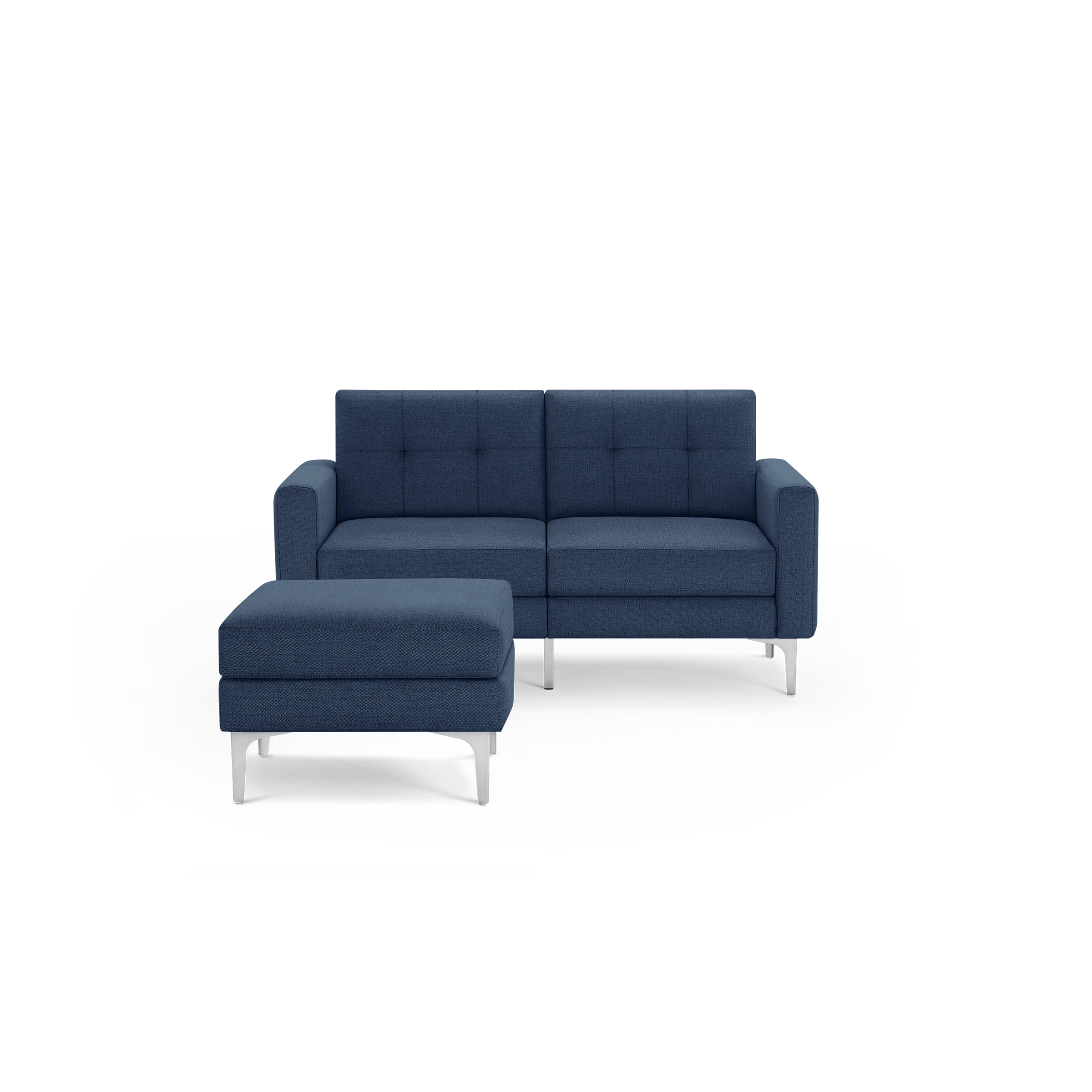 Modern navy blue fabric loveseat with matching ottoman, featuring tufted cushions and sleek silver metal legs on a transparent background.