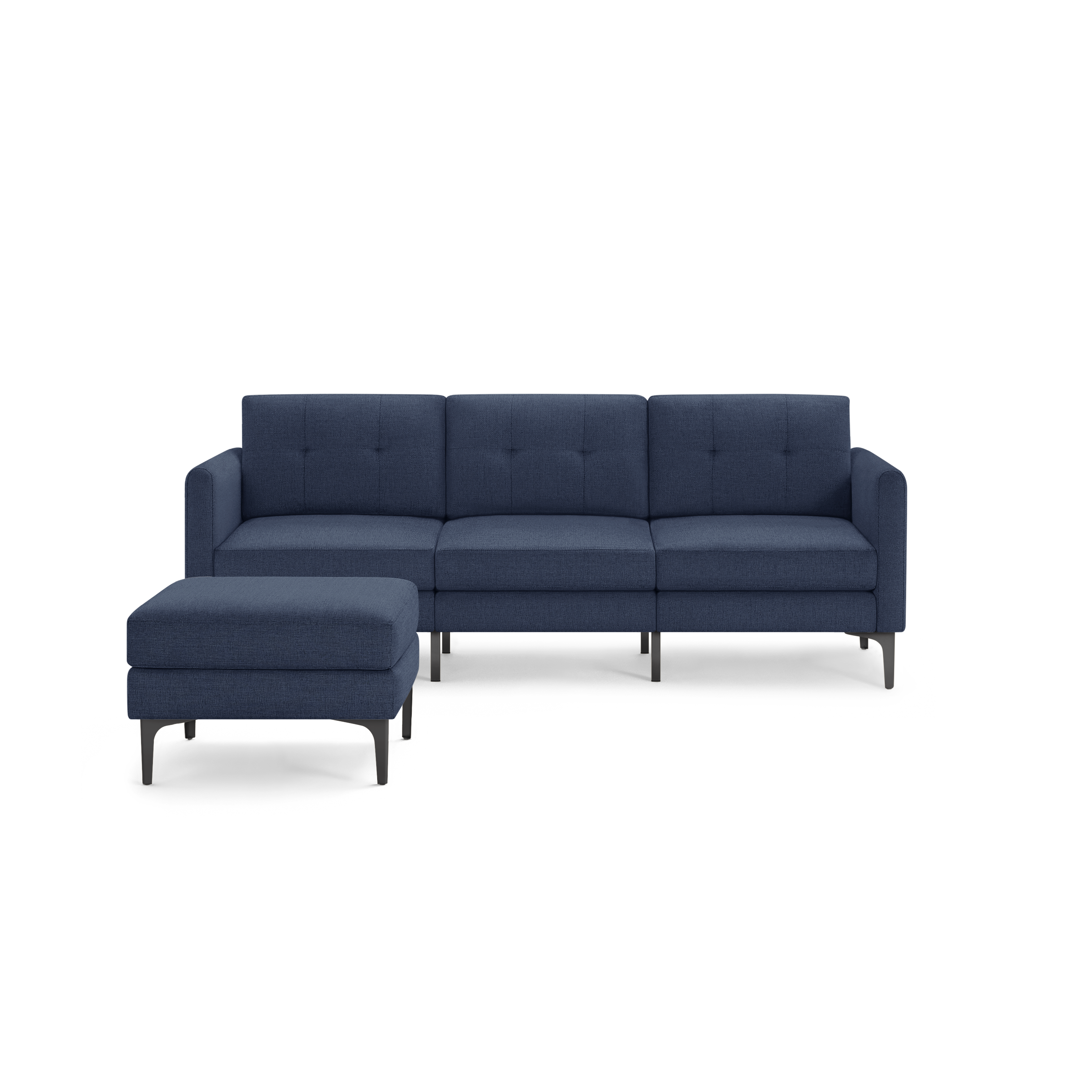 Modern navy blue fabric sectional sofa with tufted back cushions and black metal legs, accompanied by a matching upholstered ottoman.