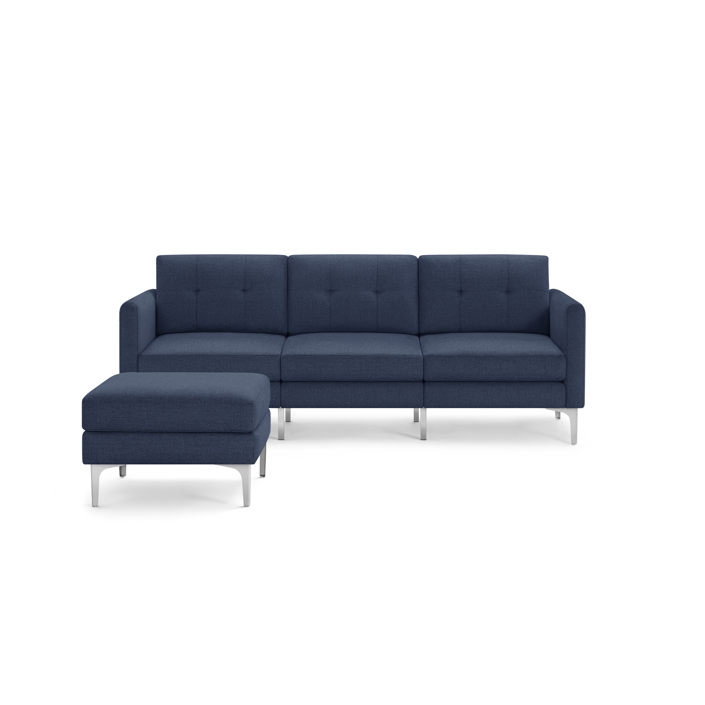 Modern L-shaped sectional sofa with deep blue fabric upholstery, tufted cushions, and sleek silver metal legs with matching ottoman.