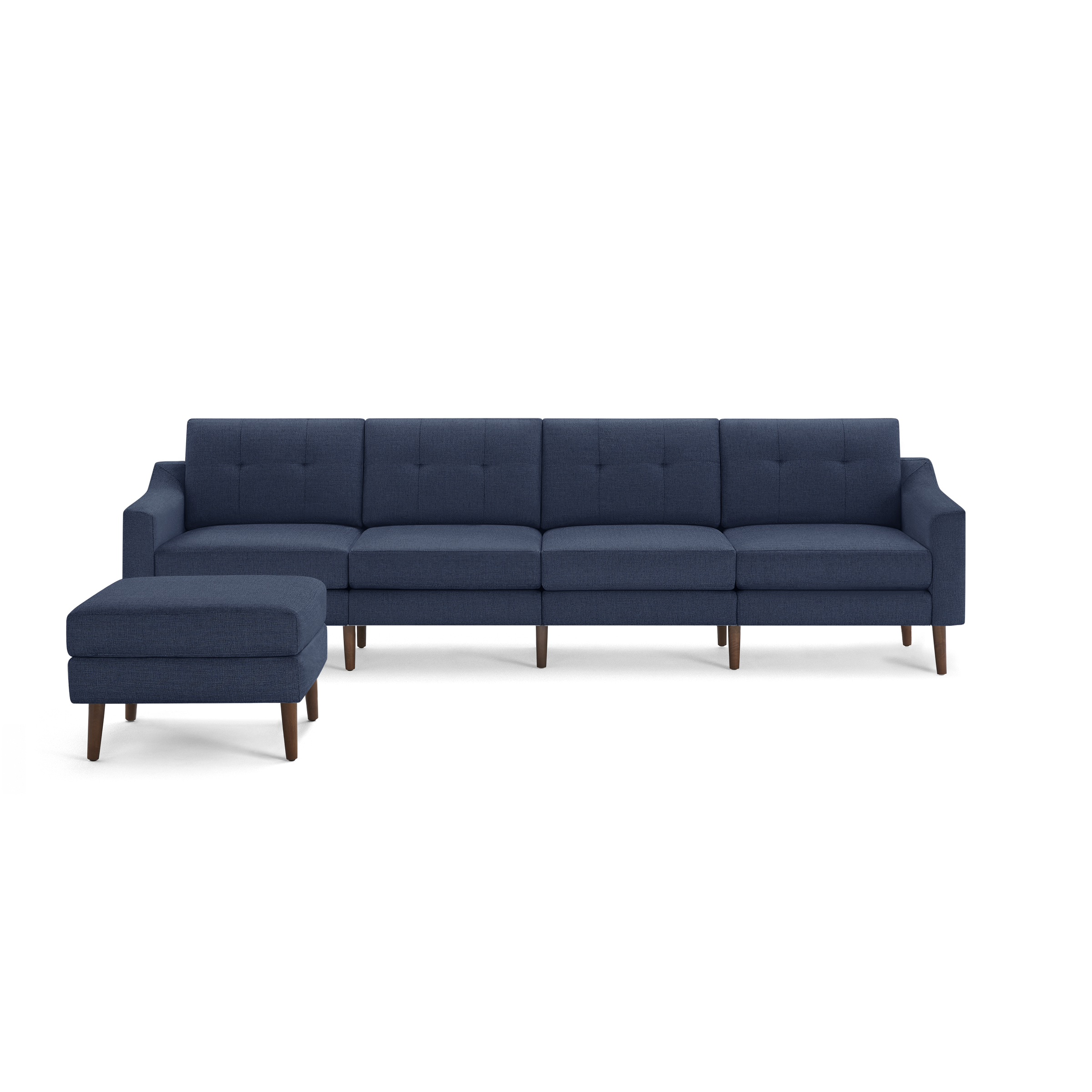 Modern navy blue sectional sofa with tufted back cushions, wooden legs, and matching ottoman on left side.
