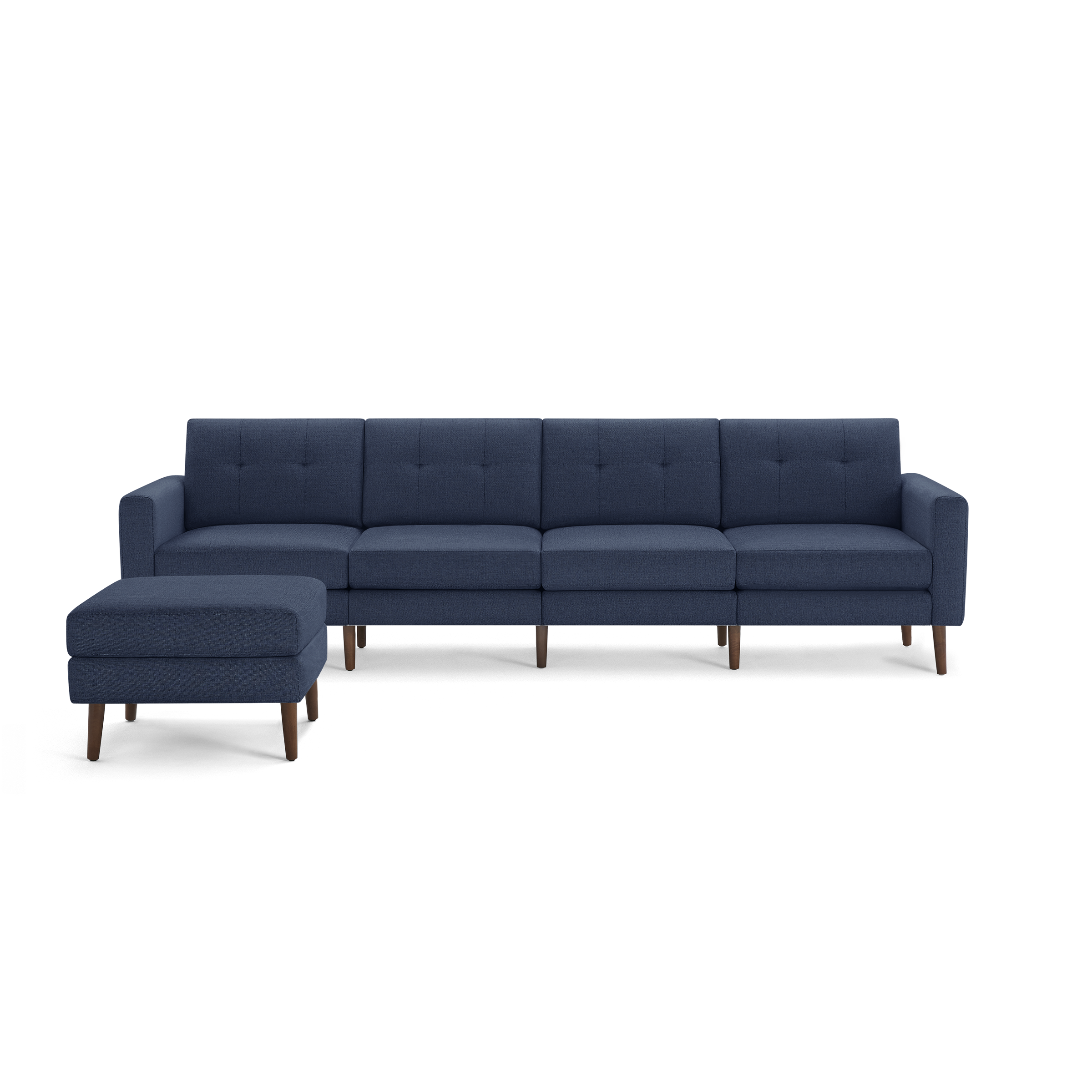 Navy blue mid-century modern sectional sofa with tufted back cushions and matching ottoman, supported by wooden legs.