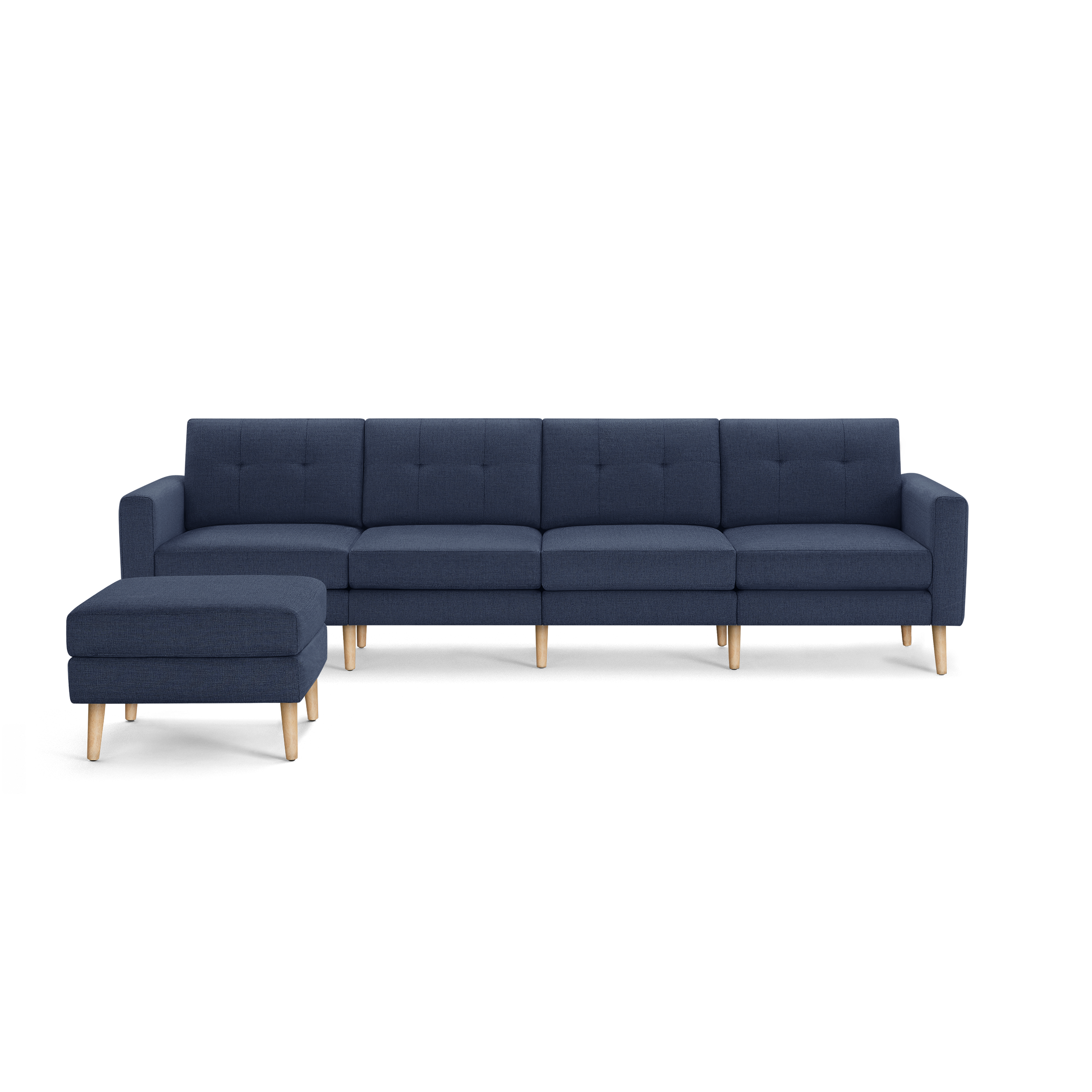 Modern navy blue sectional sofa with tufted back cushions and light wooden legs, including a matching ottoman.