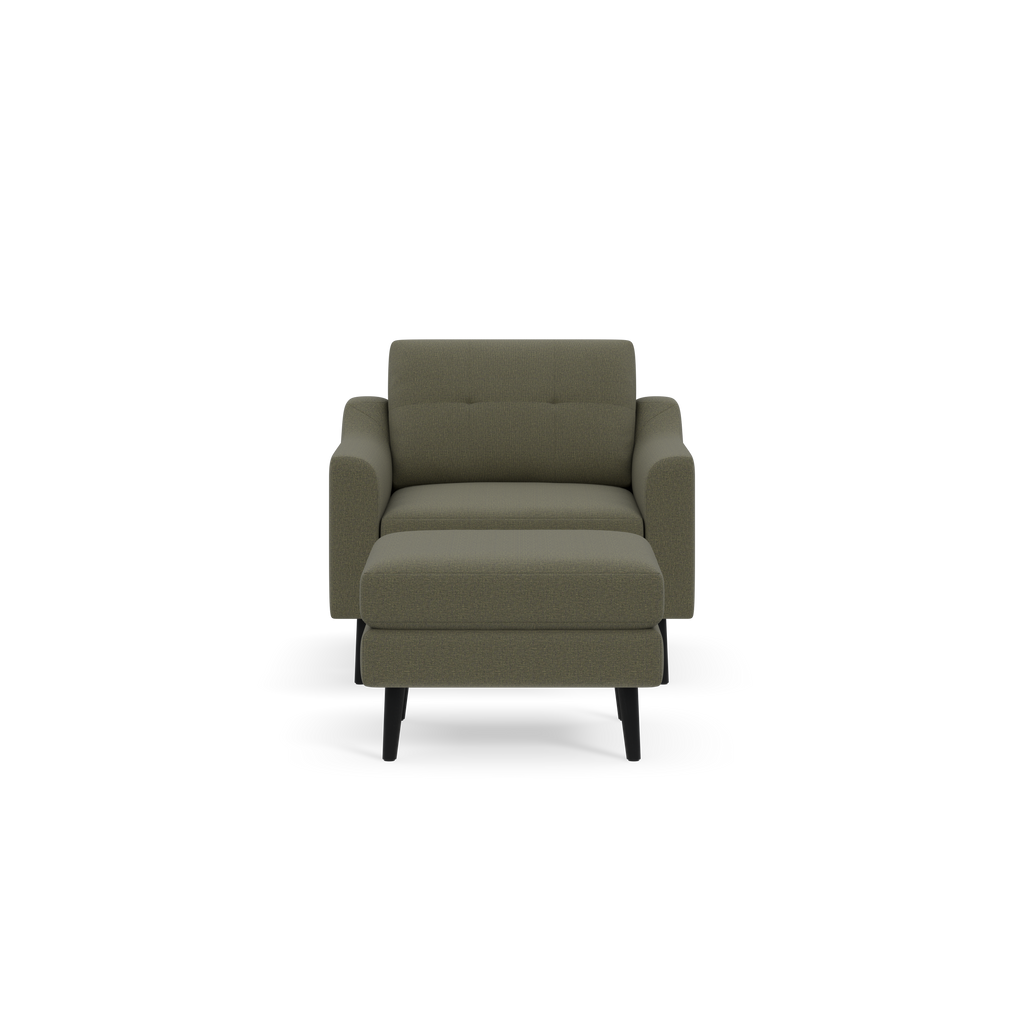 Front view of a modern Moss green upholstered armchair with matching cushioned ottoman and black wooden legs.