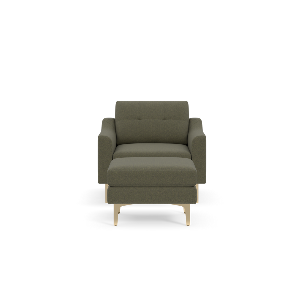 Front view of an Moss green upholstered armchair with padded arms, cushioned back, and light wooden legs.