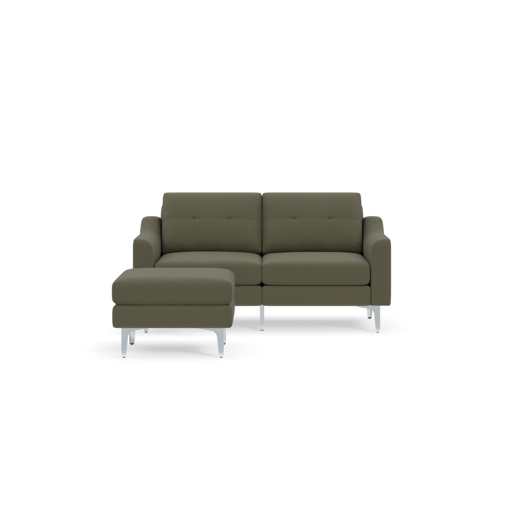 Modern Moss green fabric sectional sofa with metal legs and matching ottoman on the left side, isolated on black background.