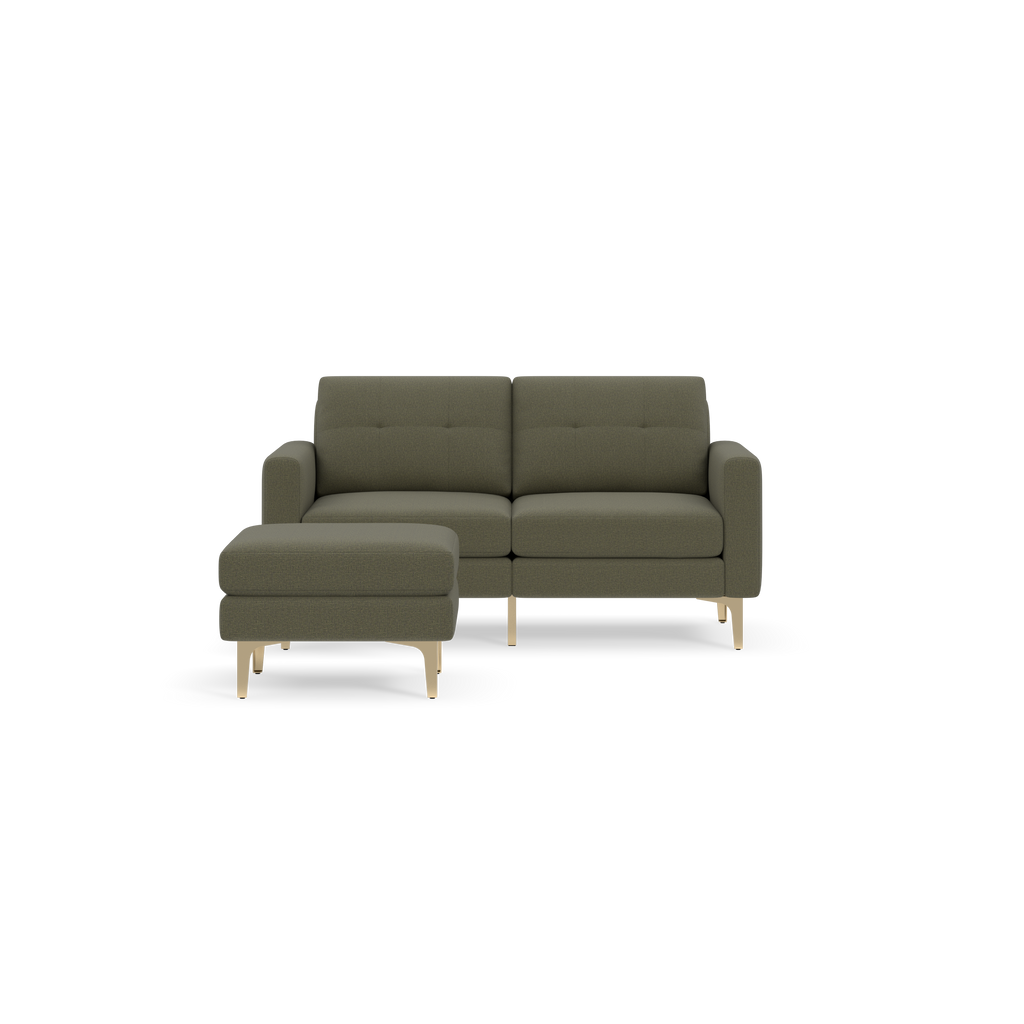 Modern Moss green two-seater sofa with matching ottoman, featuring tufted cushions and light wooden legs.