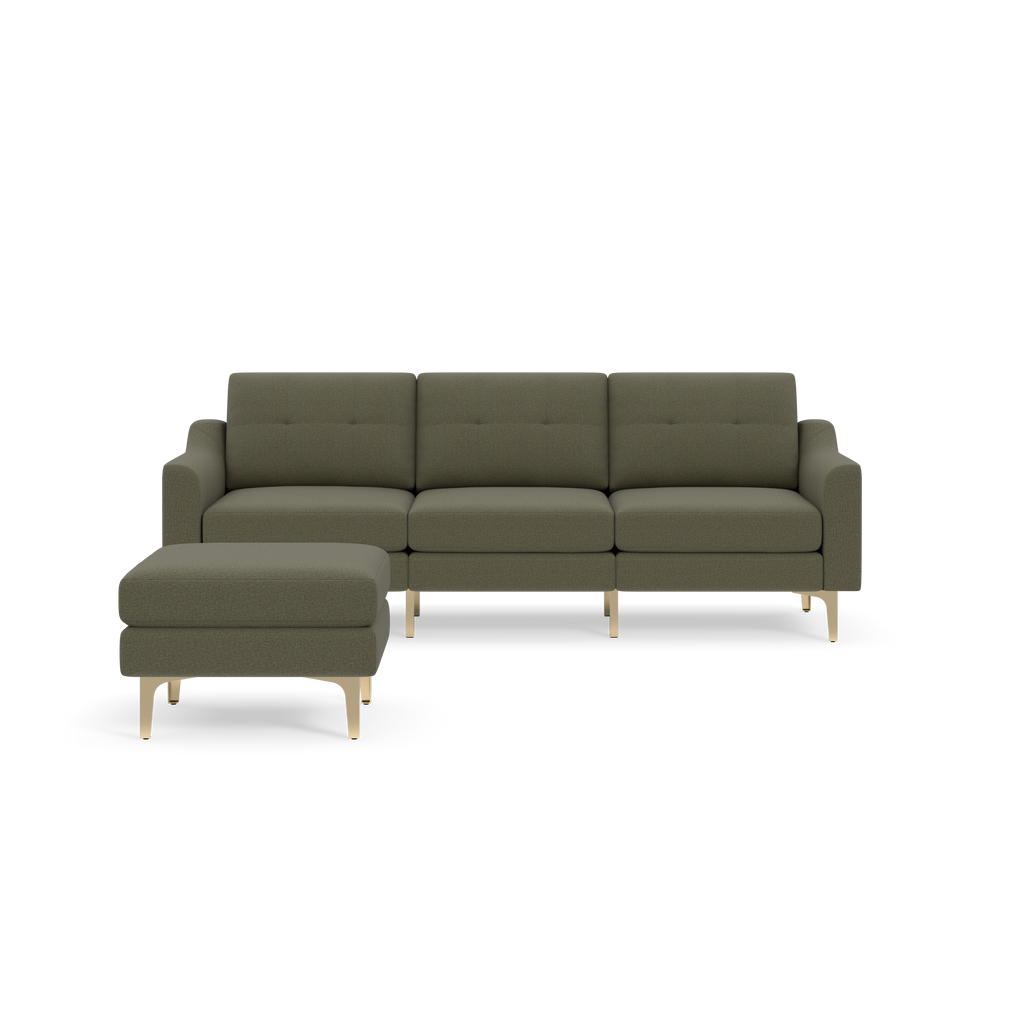 Modern Moss green sectional sofa with tufted cushions, featuring a matching ottoman and light wooden legs, set against black background.