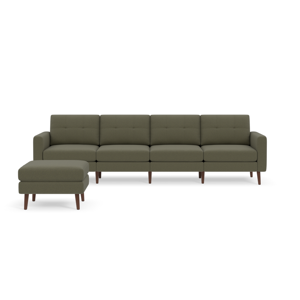 Moss green fabric sectional sofa with wooden legs and a matching ottoman, featuring tufted back cushions.